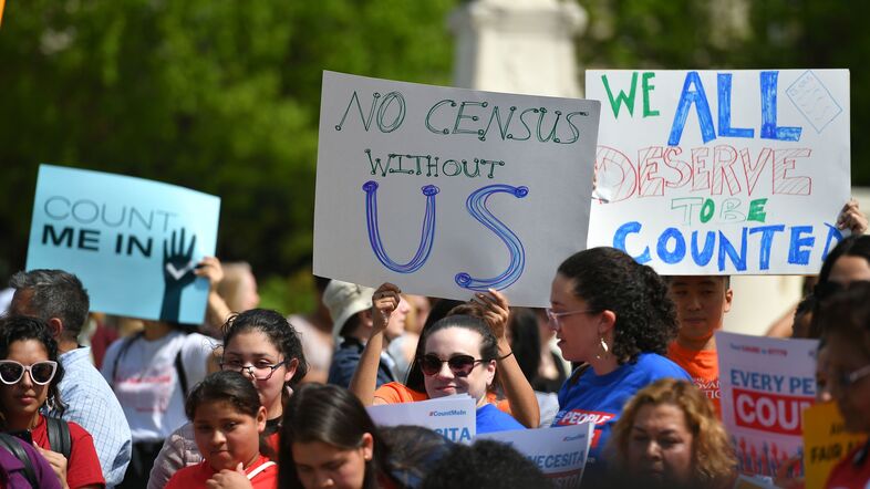 Demonstrators rally in Washington, D.C., in April to protest the Trump administration's efforts to add to 2020 census forms a citizenship question, which has since been blocked by the courts. (Mandel Ngan/AFP/Getty Images)