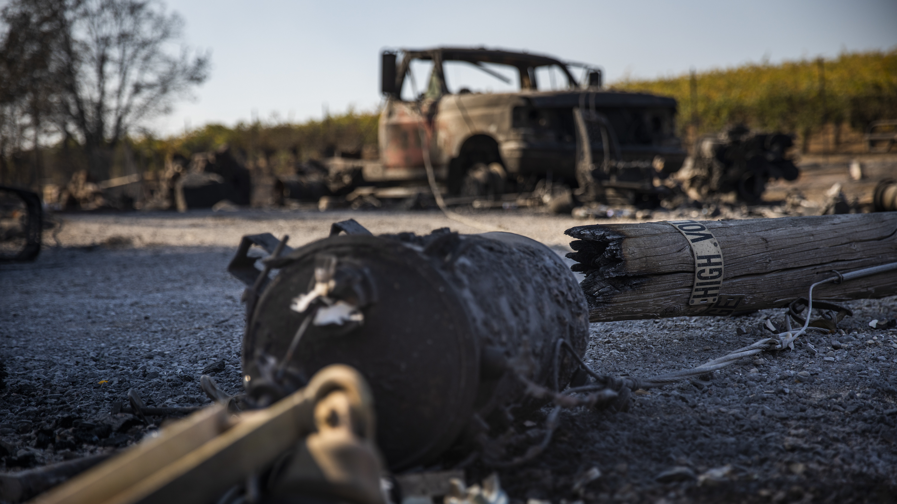 A PG&E utility pole rests on a burned-out property in Healdsburg, Calif., on Monday. The community was just one of many in Sonoma County affected by the Kincade Fire, which has swelled to a size much larger than San Francisco. (AFP via Getty Images)