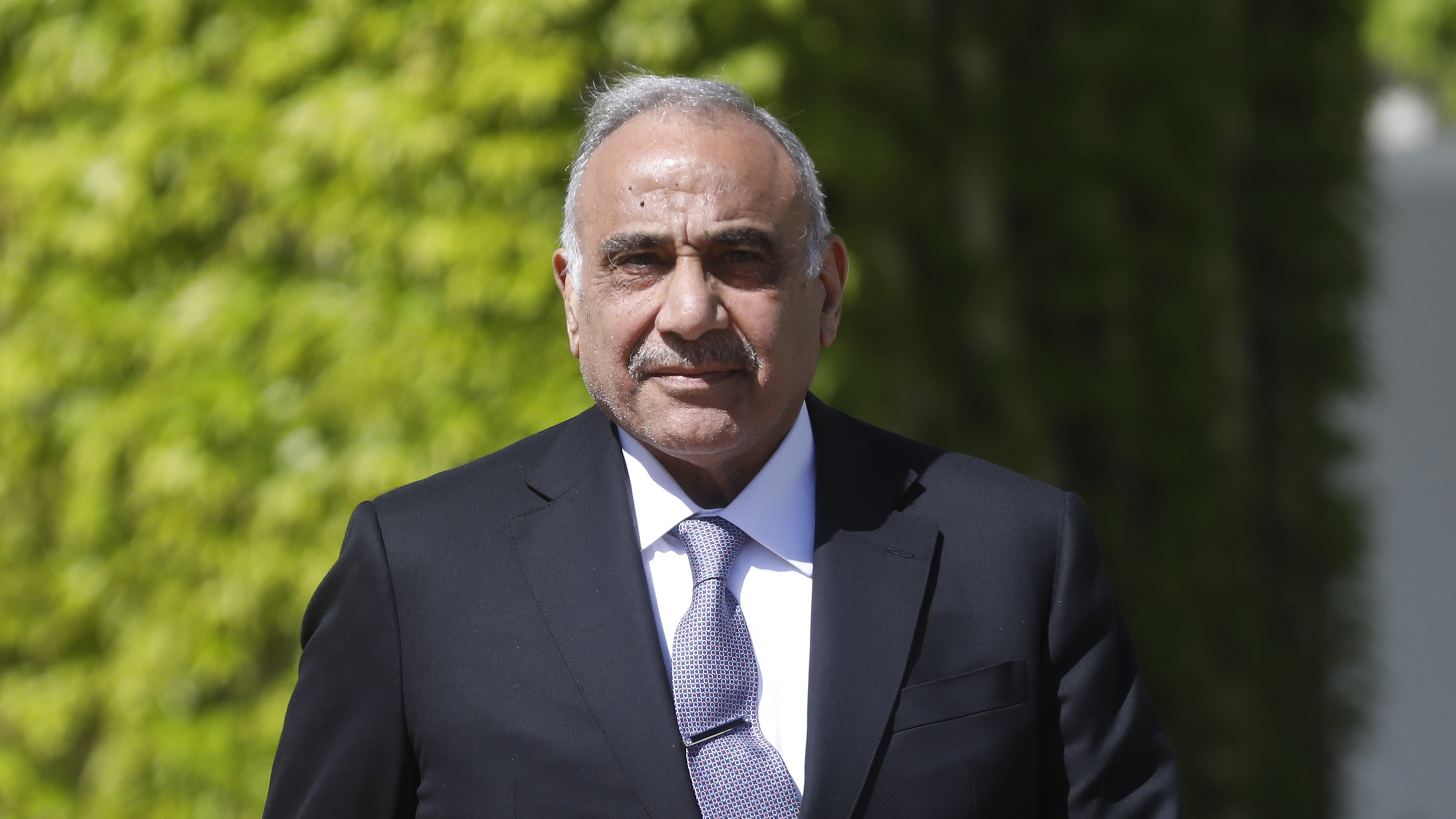 Iraqi Prime Minister Adil Abdul-Mahdi, seen earlier this year during a diplomatic visit to Berlin, has faced massive protests recently calling for his resignation. (Getty Images)