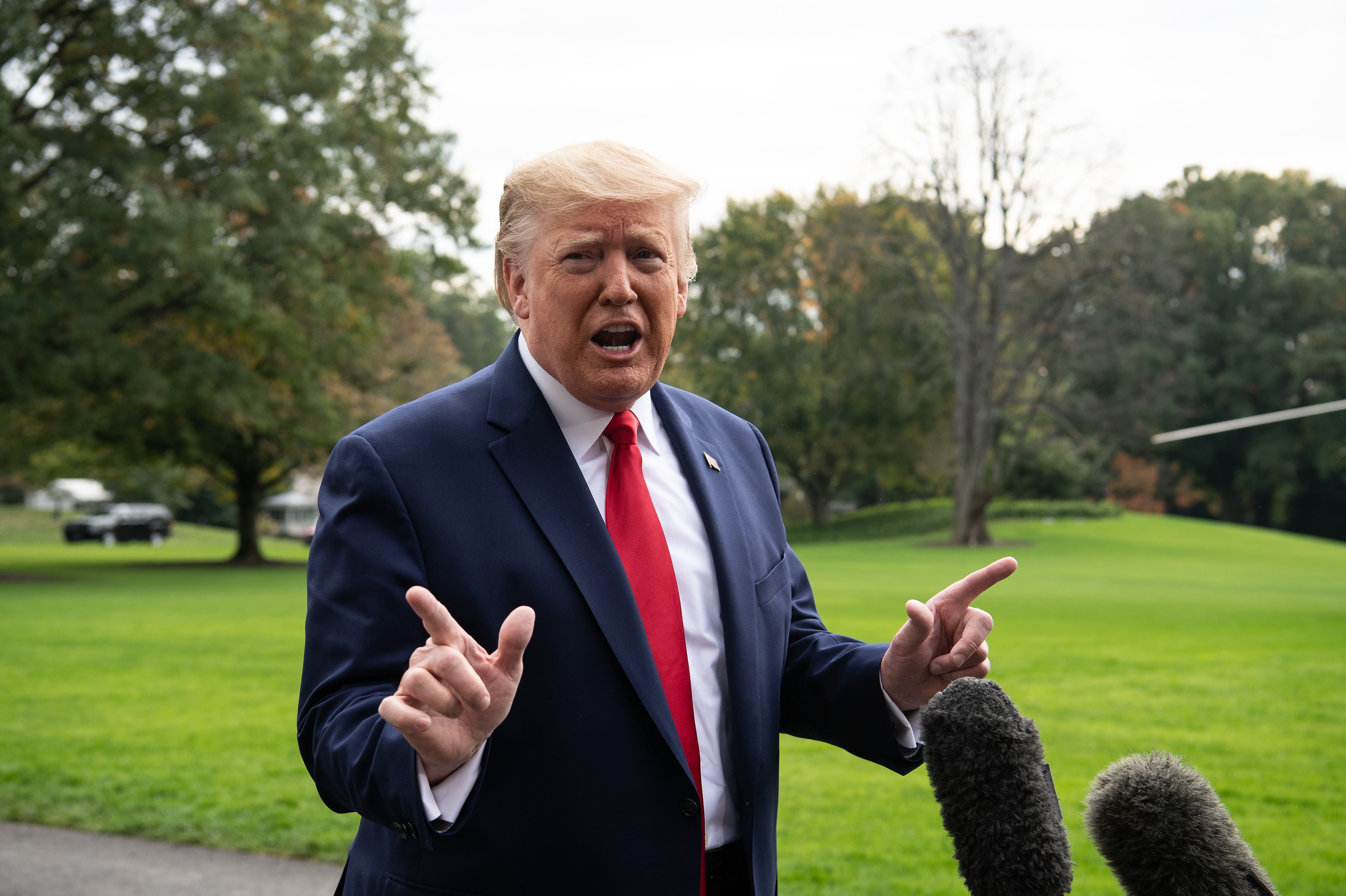President Trump and Republican allies have decried the impeachment inquiry process, but Democrats say they are following precedent. (AFP via Getty Images)