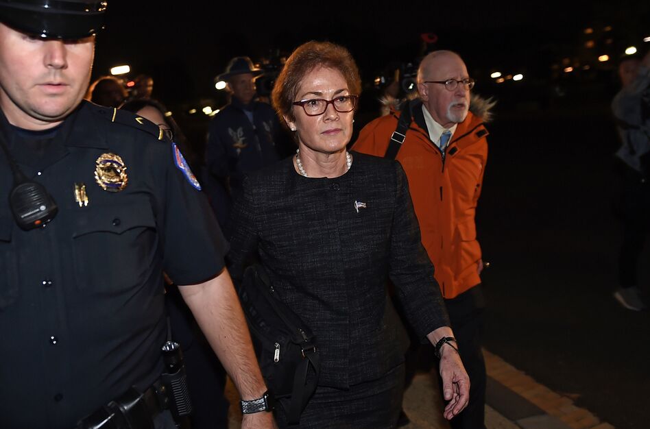 Former U.S. Ambassador to Ukraine Marie Yovanovitch, flanked by lawyers, aides and Capitol police, leaves the Capitol on Oct. 11 after testifying behind closed doors to the House Intelligence, Foreign Affairs and Oversight committees as part of the ongoing impeachment investigation into President Trump. (Olivier Douliery/AFP via Getty Images)