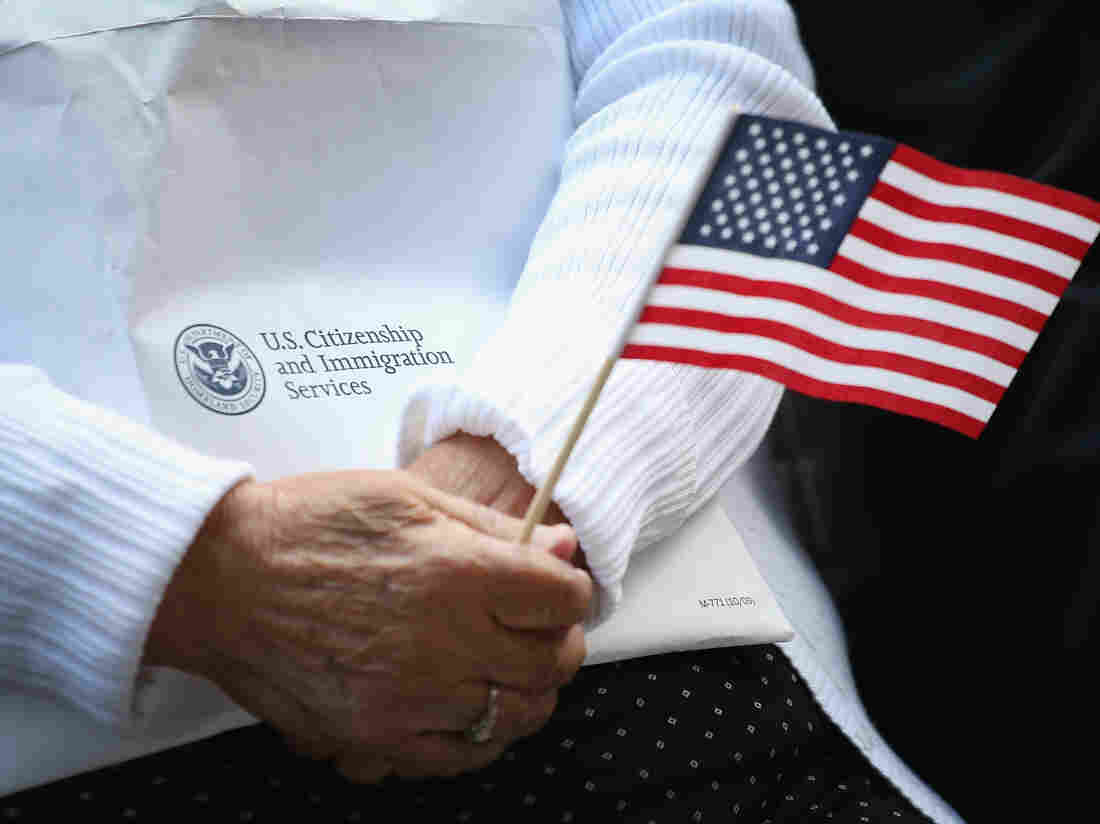 CHICAGO, IL - SEPTEMBER 16: Immigrants from 25 countries participate in a naturalization ceremony in Daley Plaza on September 16, 2014 in Chicago, Illinois. Seventy people were awarded their U.S. citizenship at the Citizenship Day ceremony. (Photo by Scott Olson/Getty Images)