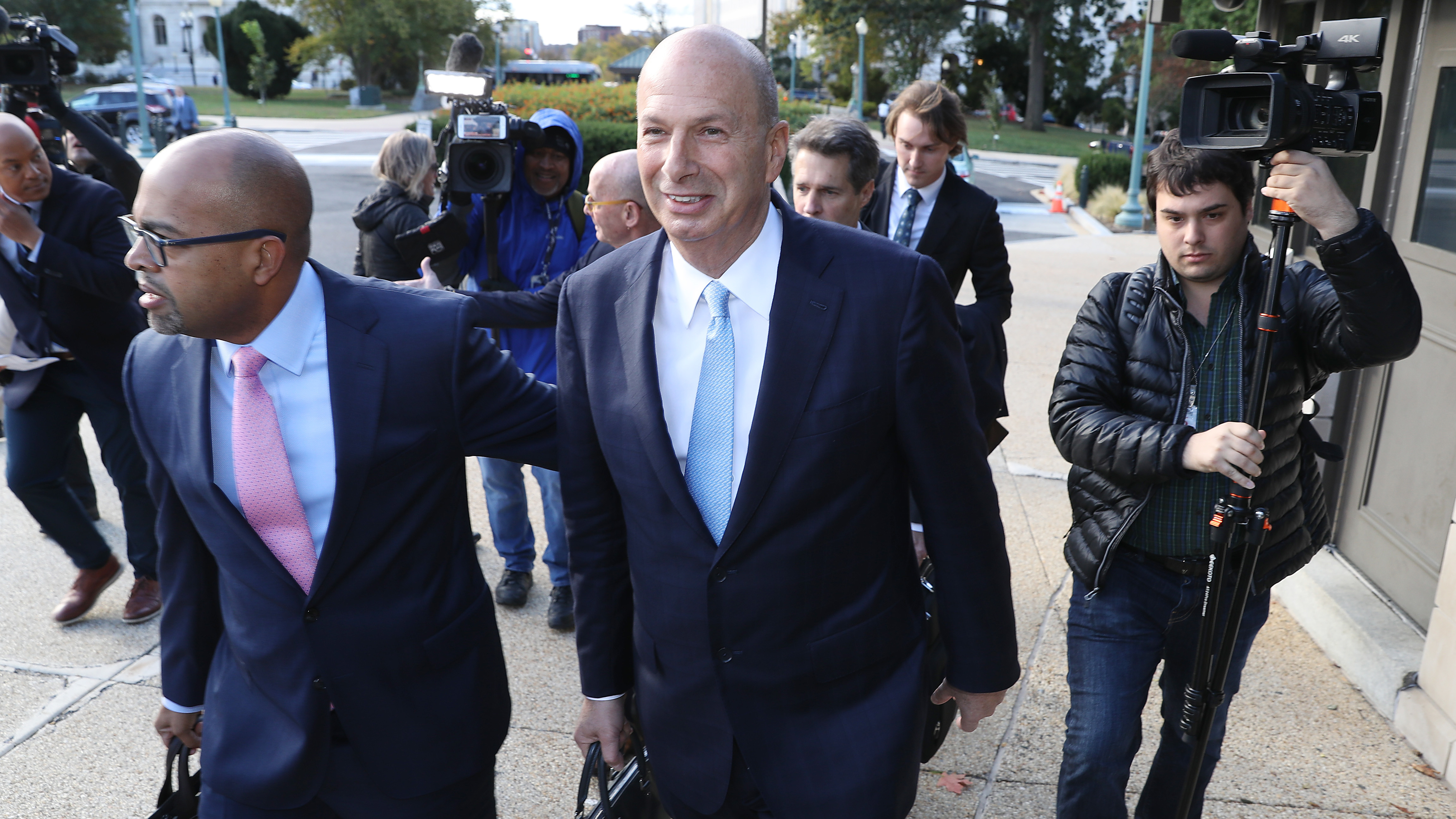 U.S. Ambassador to the European Union Gordon Sondland (center) arrives at the U.S. Capitol on Oct. 17. The transcript of his testimony, as well as a supplemental statement, was released on Tuesday. (Getty Images)