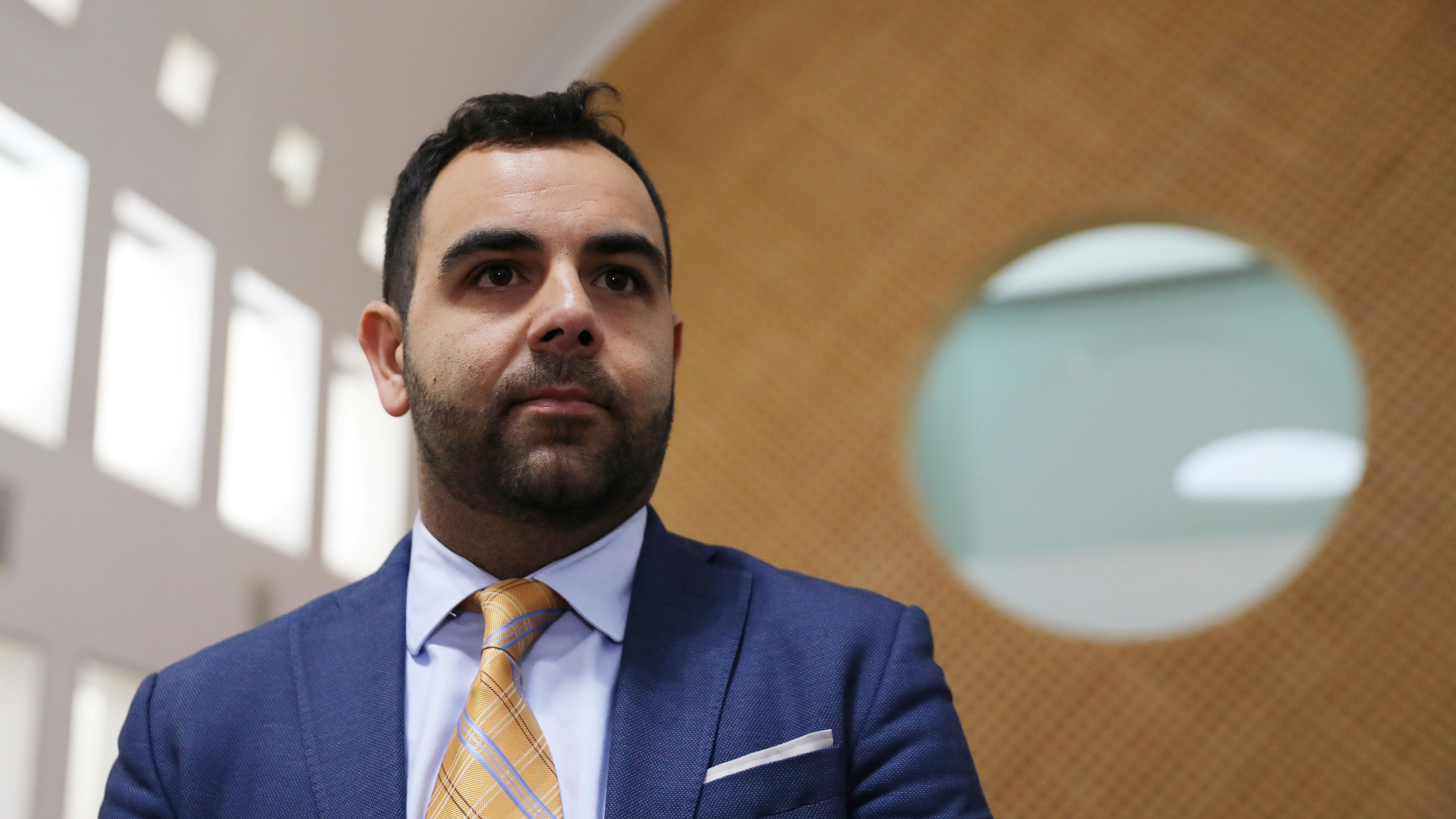 Omar Shakir, who oversees Israeli and Palestinian policy for Human Rights Watch, awaits a hearing in September at Israel's Supreme Court in Jerusalem. The court affirmed Shakir's deportation, a move that has prompted protests from members of the international community. (Reuters)