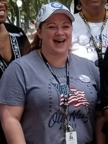 Chasity Wohlford, a Navy veteran in Houston, says she fell victim to a payday lender who charged her nearly three times what she borrowed in just eight months. She is pictured taking part in Women Veteran's Day in Austin last June.