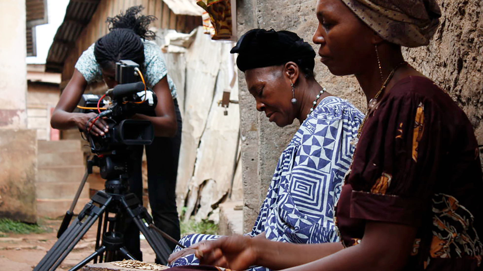 Rosine Mbakam, left, says she chose to shoot all images and sound herself to maintain an equal relationship with the subjects of her films.
