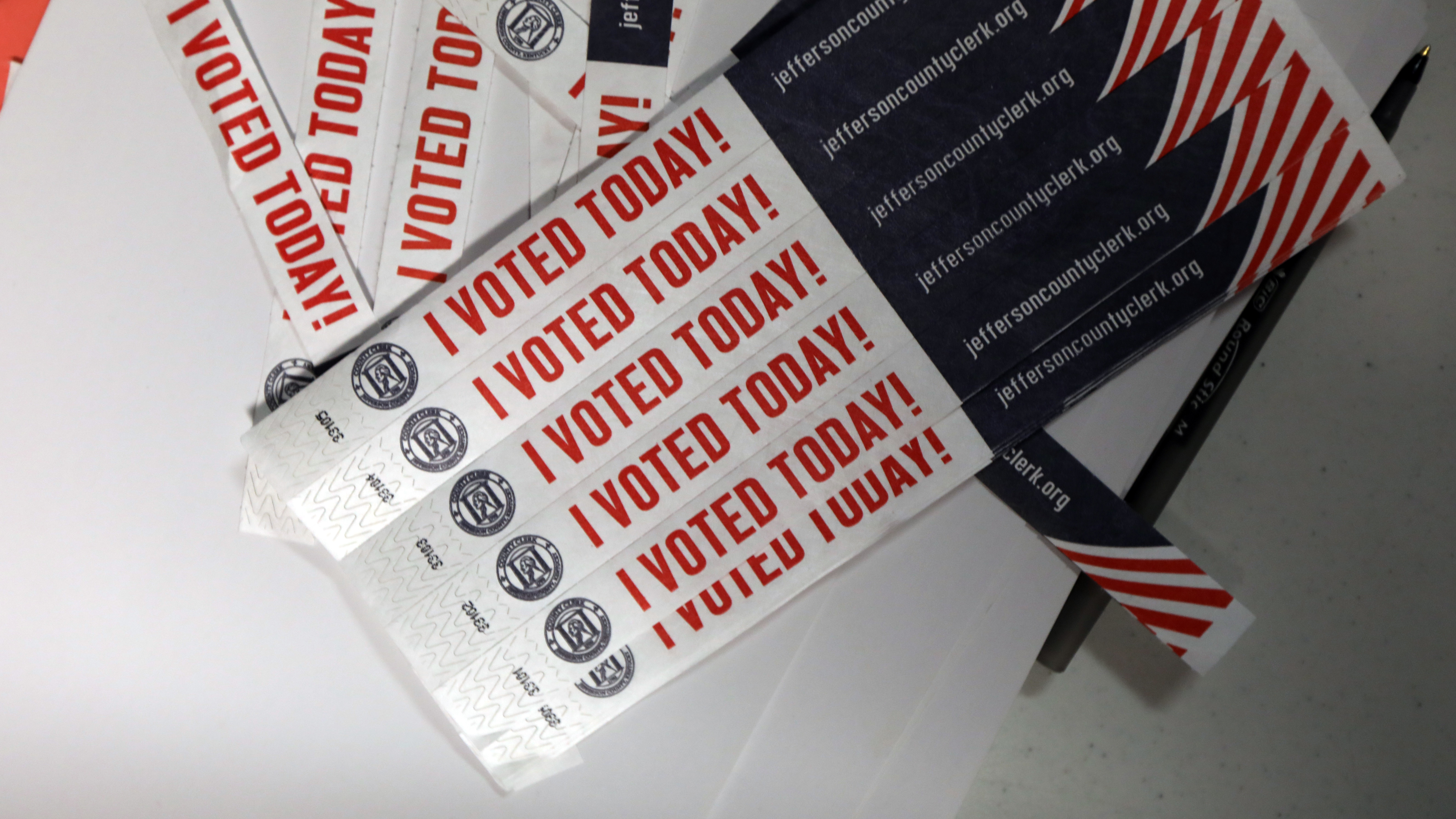 Despite unanswered questions about security and transparency, mobile voting pilots aimed at overseas and military voters move forward in a number of states. Above, wristbands noting &quot;I Voted Today!&quot; are available at Sojourn Community Church in Louisville, Ky., on Election Day this year. (Getty Images)