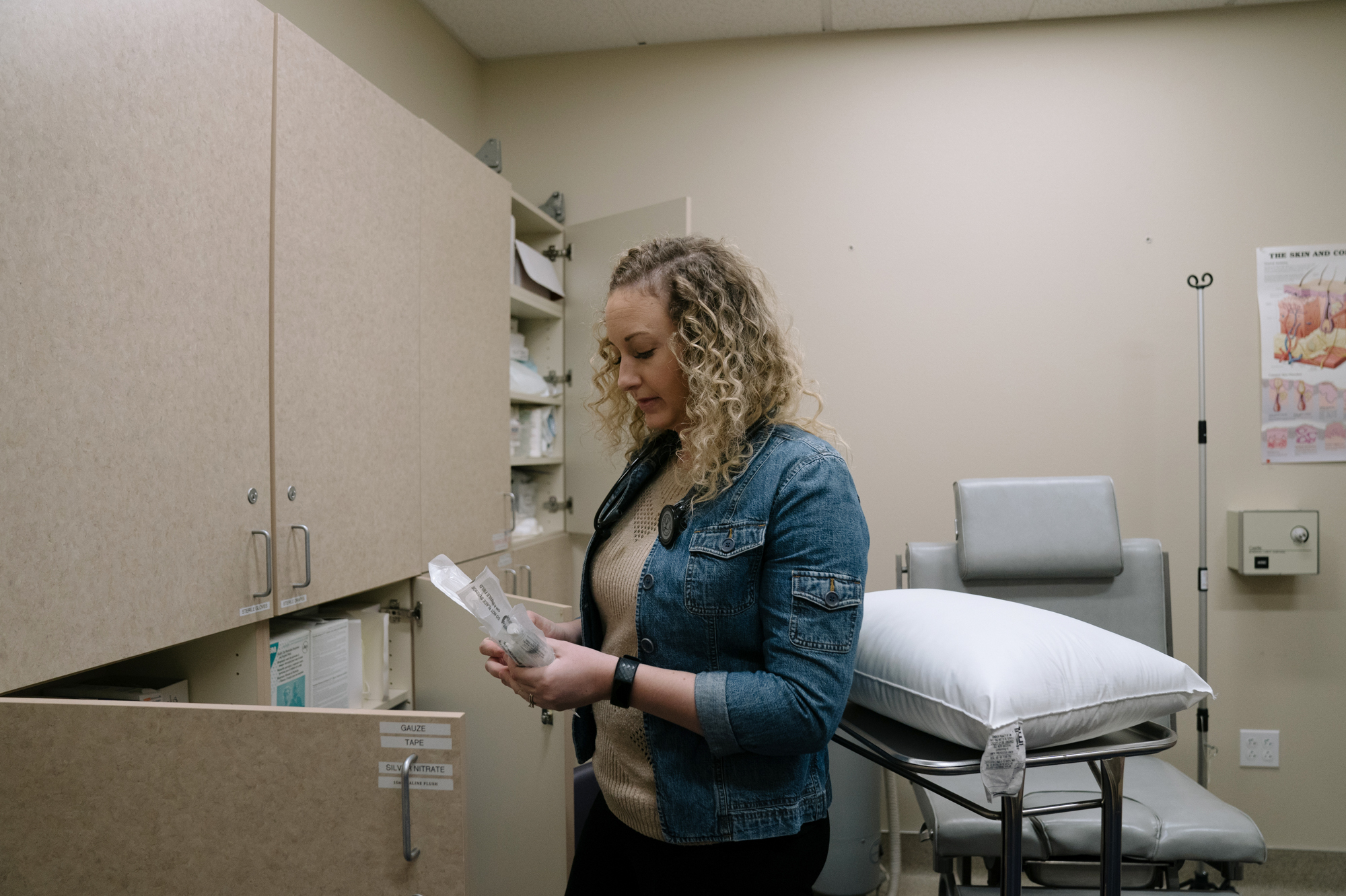 Katie Buckman, a third-year medical student at Pacific Northwest University of Health Sciences, gathers supplies for her volunteer work at the Yakima Union Gospel Mission's medical clinic.