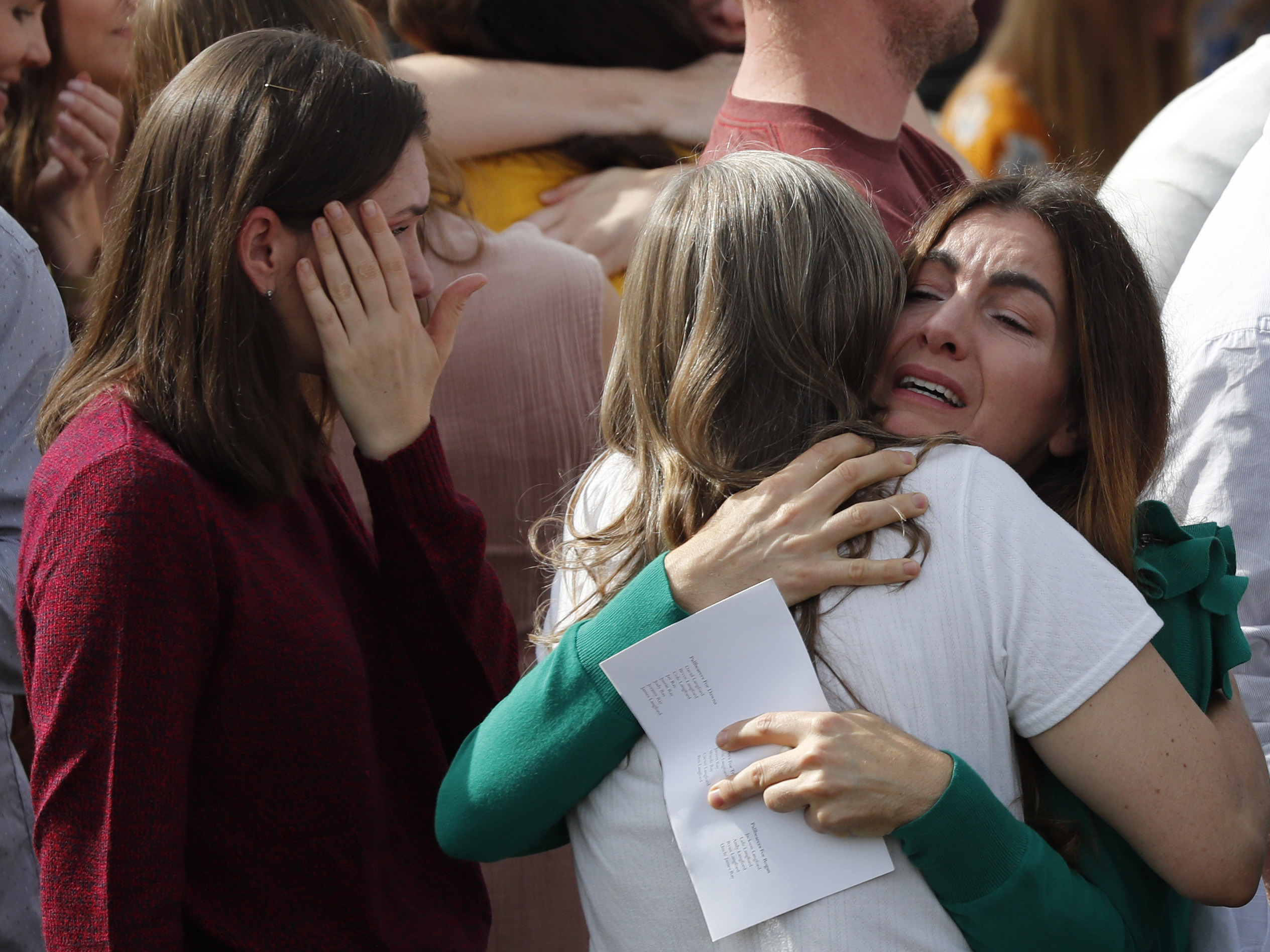 People attend the funeral of Dawna Ray Langford, 43, and her sons Trevor, 11, and Rogan, 2, who were killed by drug cartel gunmen, at a family cemetery in La Mora, Sonora state, Mexico on Thursday.