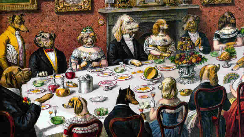 A group of well-dressed dogs take part in a banquet.