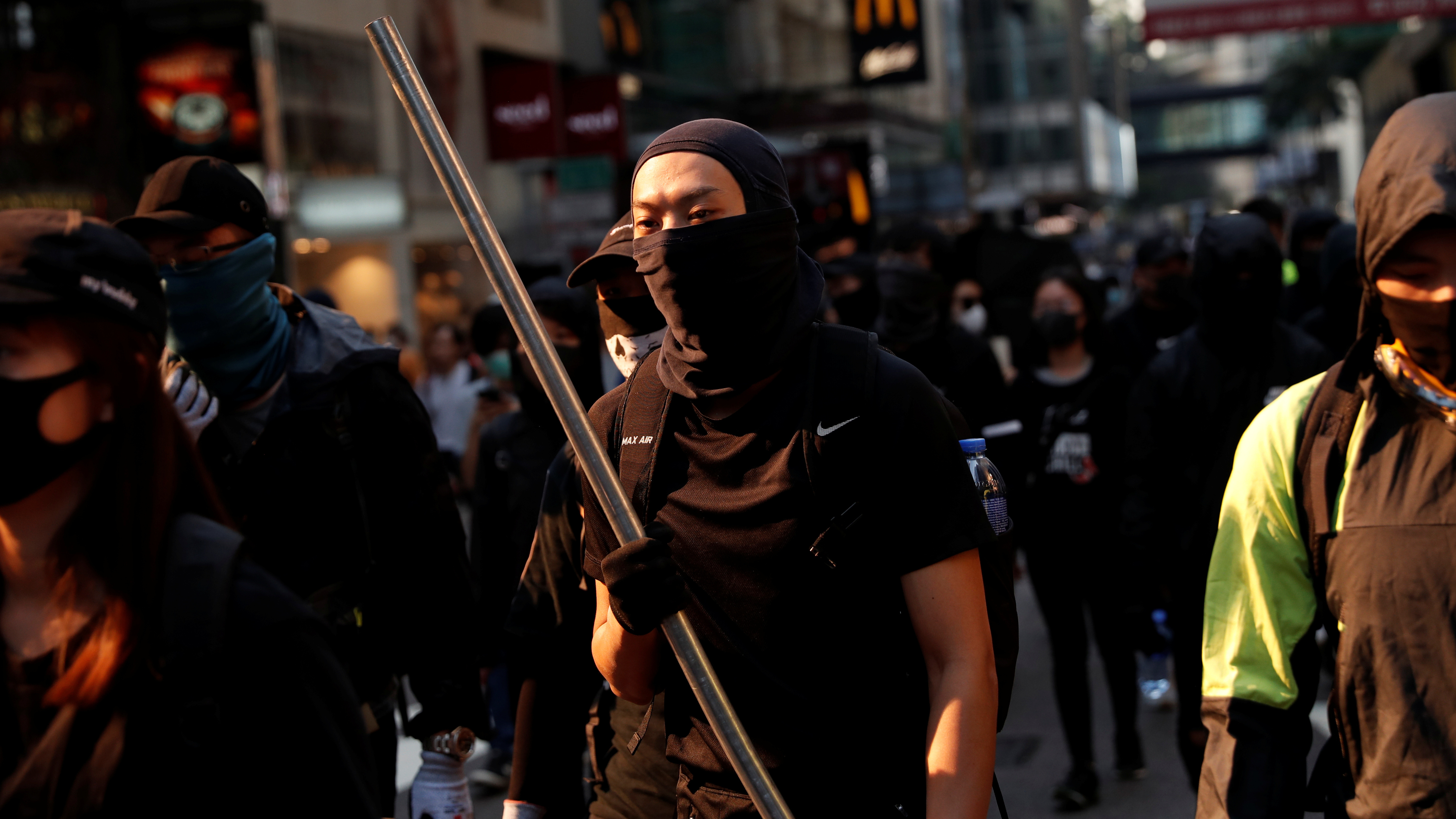 Protesters attend a demonstration in Hong Kong on Monday, as clashes intensified between pro-democracy activists and police. (Reuters)
