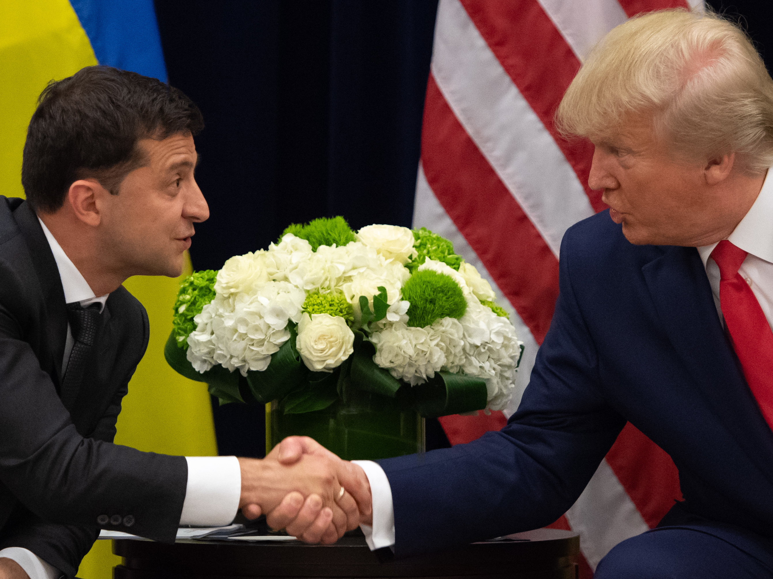 President Trump and Ukrainian President Volodymyr Zelenskiy shake hands during a meeting in New York on Sept. 25, on the sidelines of the United Nations General Assembly. (AFP via Getty Images)