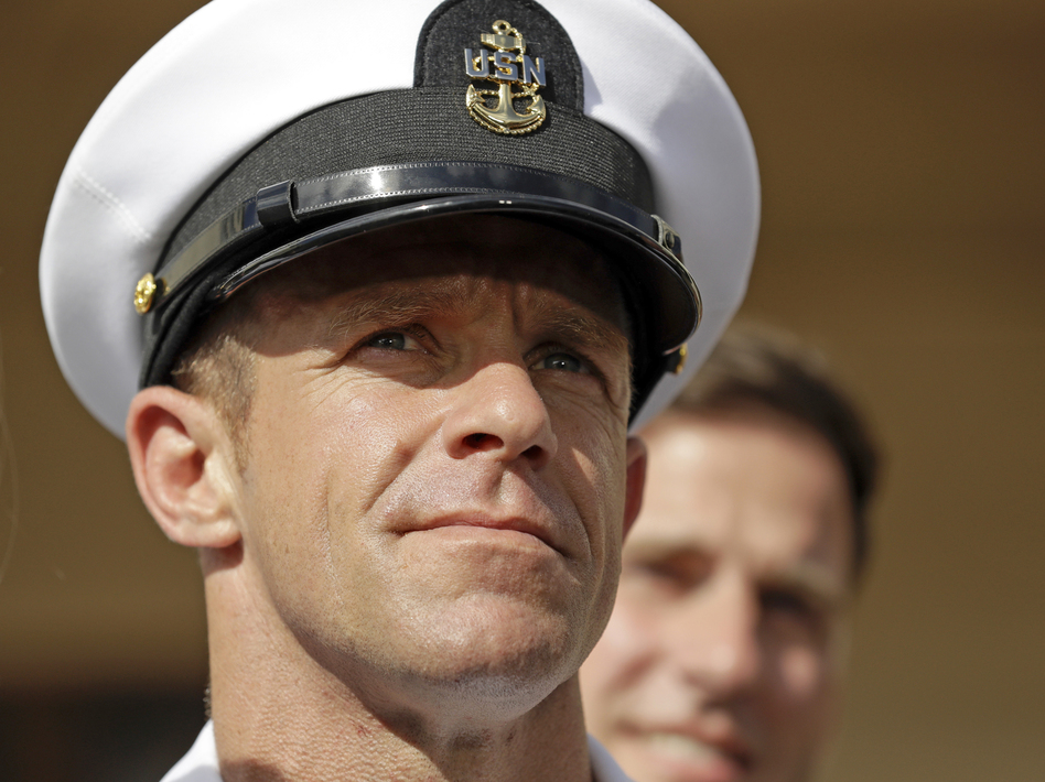Navy Special Operations Chief Edward Gallagher leaves a military court on Naval Base San Diego in July. He was acquitted of murdering an Iraqi teen, but convicted on a lesser charge. (Gregory Bull/AP)