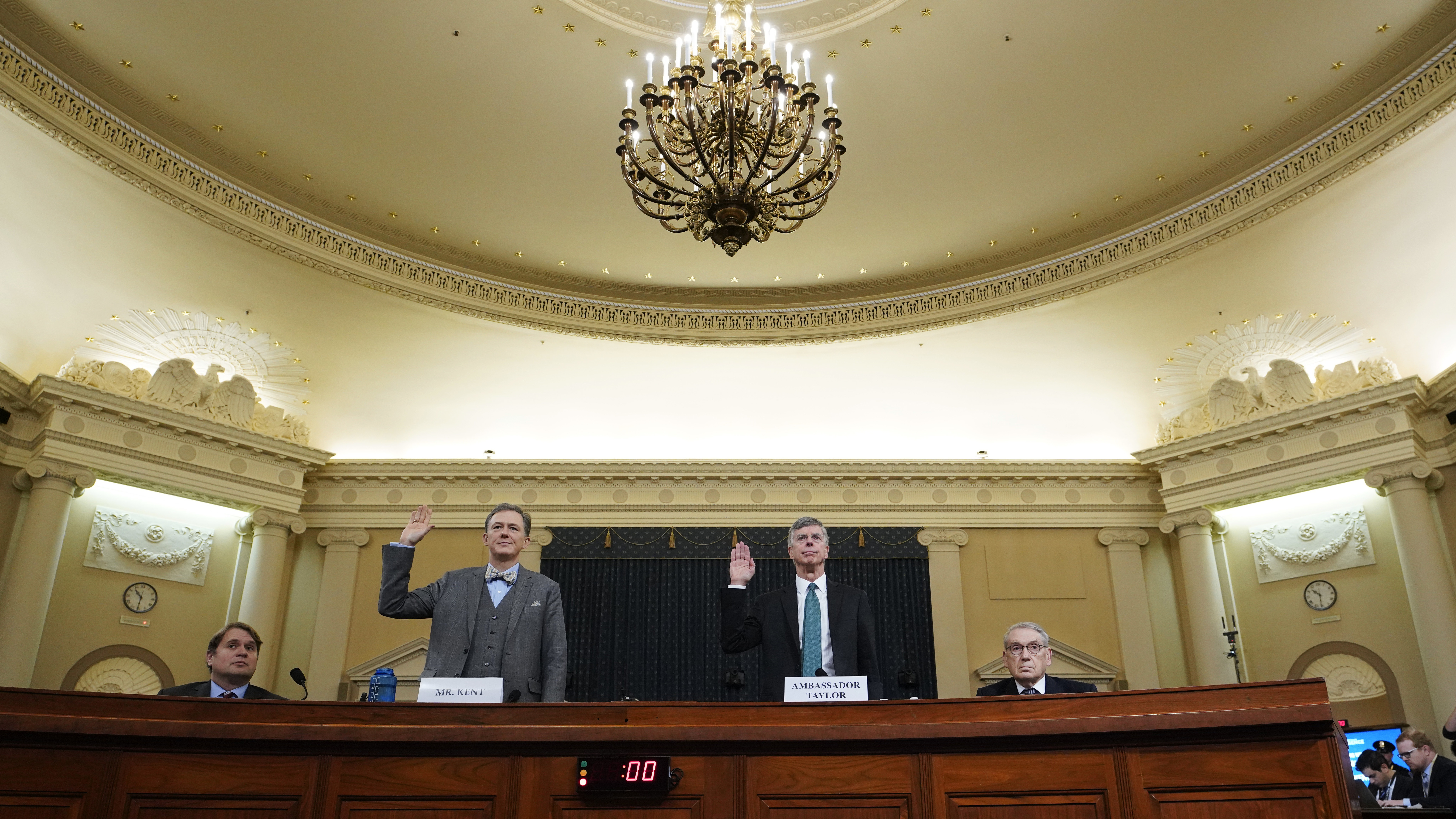 Deputy Assistant Secretary for European and Eurasian Affairs George Kent and top U.S. diplomat in Ukraine William Taylor are sworn in prior to testifying before the House Intelligence Committee on Wednesday. (Getty Images)