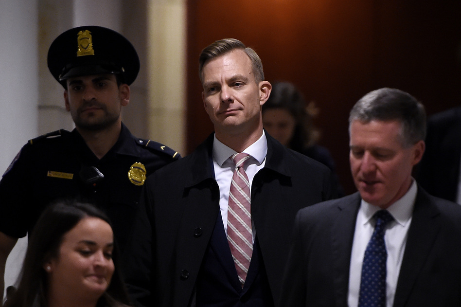 David Holmes, a State Department official, arrives to a closed-door deposition in the House impeachment inquiry. (Olivier Douliery/AFP via Getty Images)