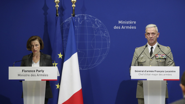 French Defense Minister Florence Parly (left) and French Army Chief of Staff Gen. Franois Lecointre said Tuesday that two helicopters collided in midair and killed 13 French soldiers fighting Islamic extremists in Mali.