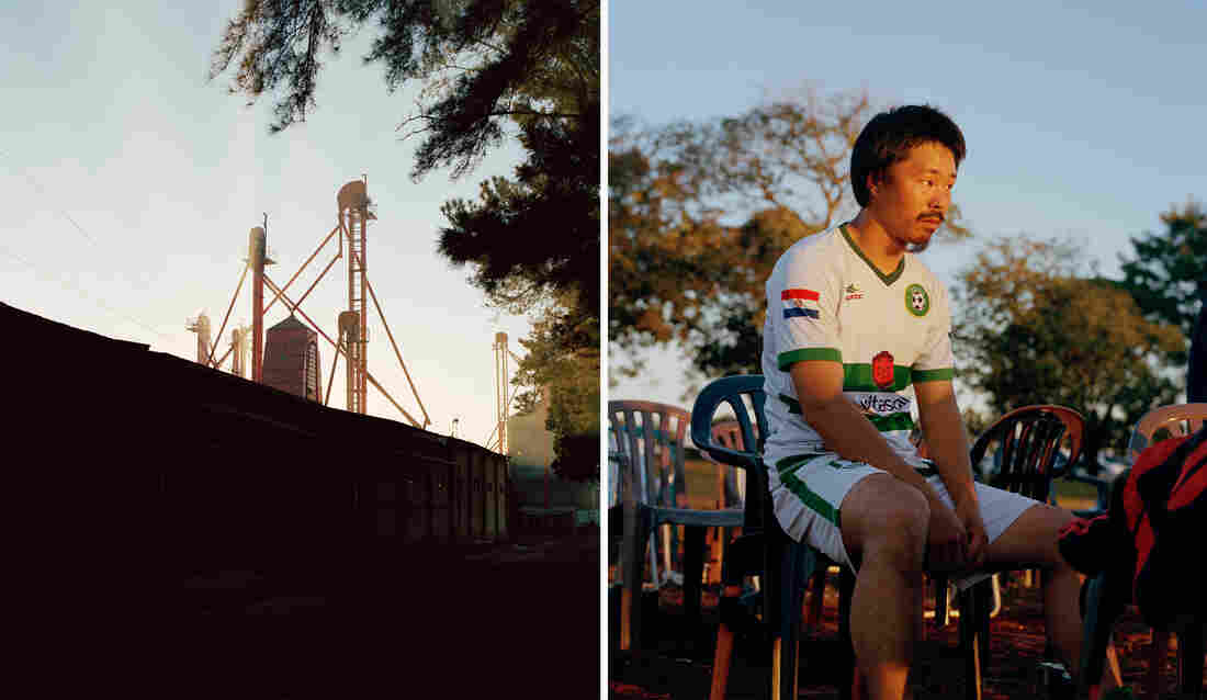 Left: Silos are seen behind a wall. Right: A man wearing a soccer jersey sits in a plastic chair as the sunsets.
