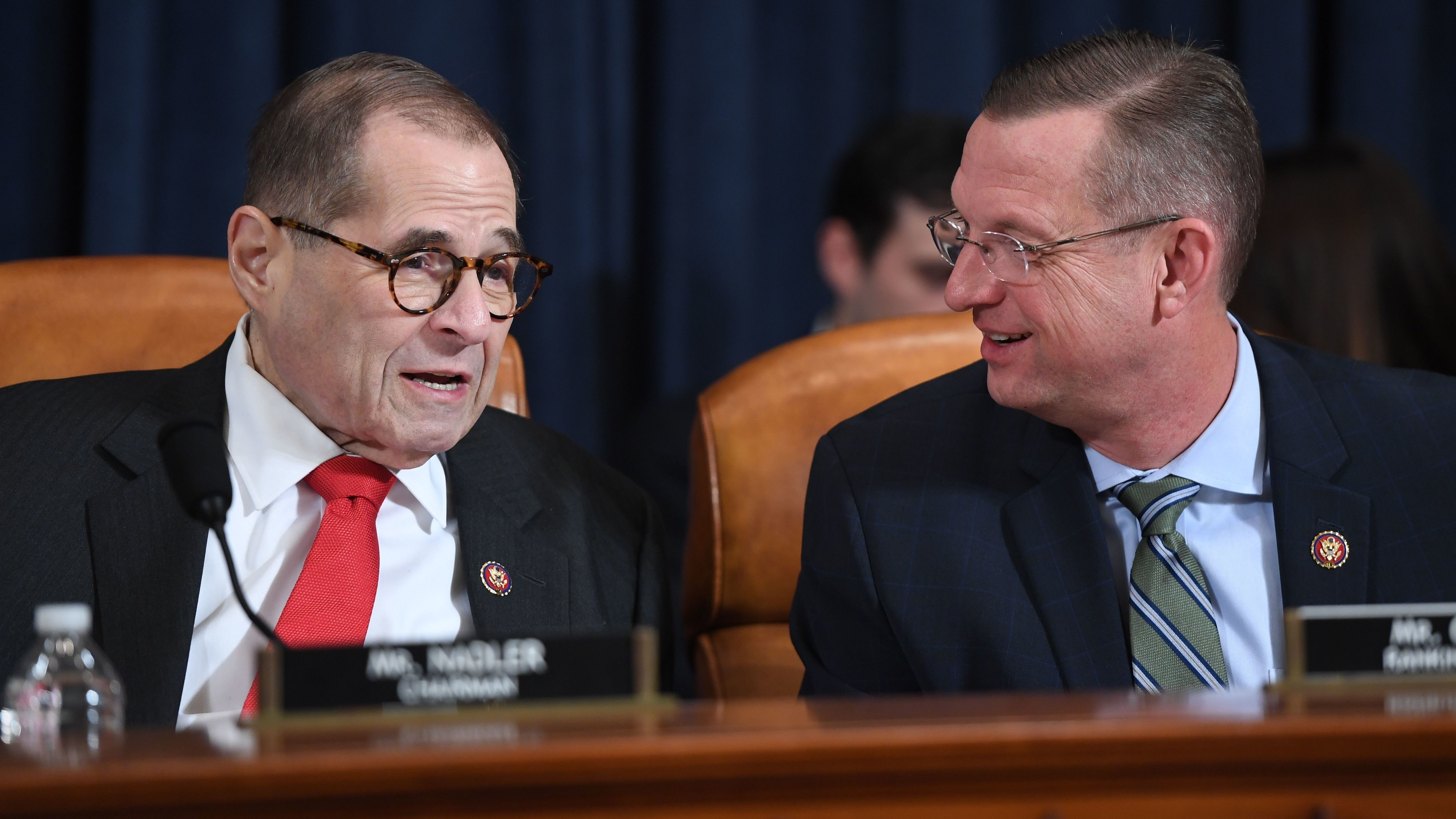 House Judiciary Chairman Jerry Nadler, D-N.Y., speaks with ranking member Doug Collins, R-Ga., at Monday's impeachment hearing. (AFP via Getty Images)