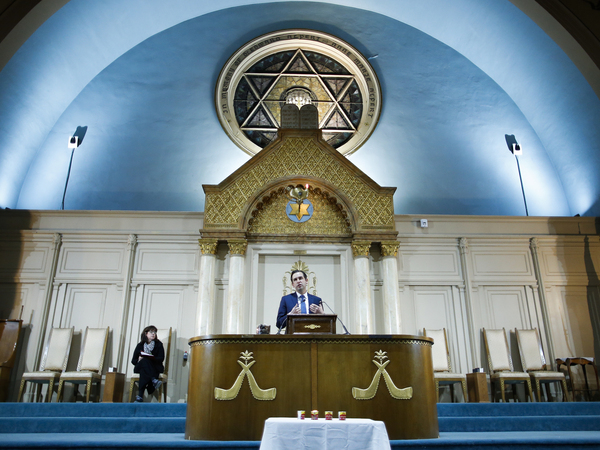 Jersey City Mayor Steven Fulop speaks during a vigil Wednesday for the shooting victims in Jersey City, N.J. Earlier that day, Fulop, who is Jewish himself, made clear to reporters that he believed the attack on a kosher market was an anti-Semitic act: "There is no question that this is a hate crime."