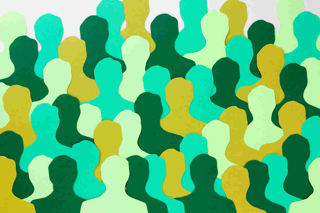 Psychological Science Accelerator Pushes For Large-Scale 2 Lots of silhouettes made with paper for crowd concept.