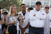 Adriana Jones, a member of the LeBaron family, holds images of relatives who were killed in November. Jones and other family members were participating in a Dec. 1 protest in Mexico City against Mexican President Andrés Manuel López Obrador to express anger and frustration over increasingly appalling incidents of violence.