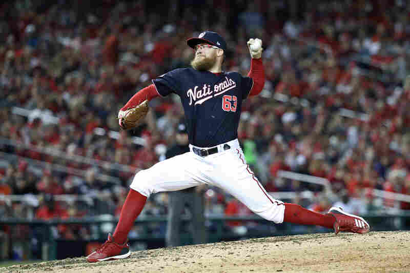 Sean Doolittle of the Washington Nationals delivers the pitch against the Houston Astros during the seventh inning in Game 5 of the 2019 World Series at Nationals Park on Oct. 27.