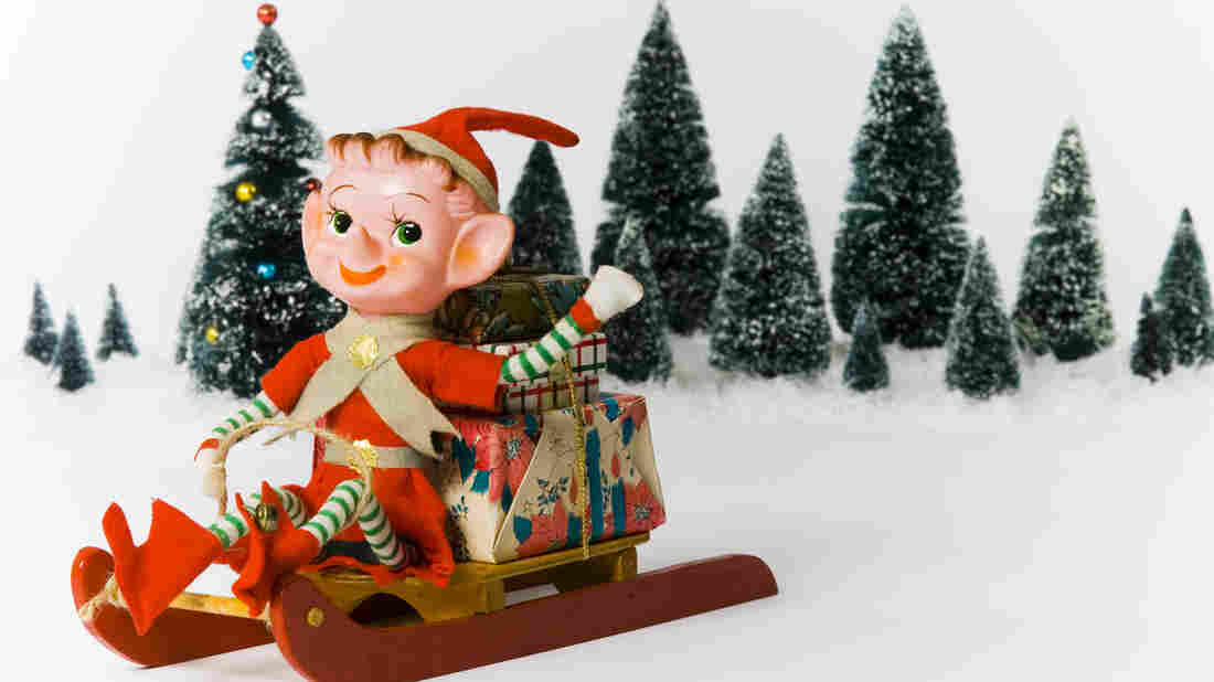 An elf on a sleigh