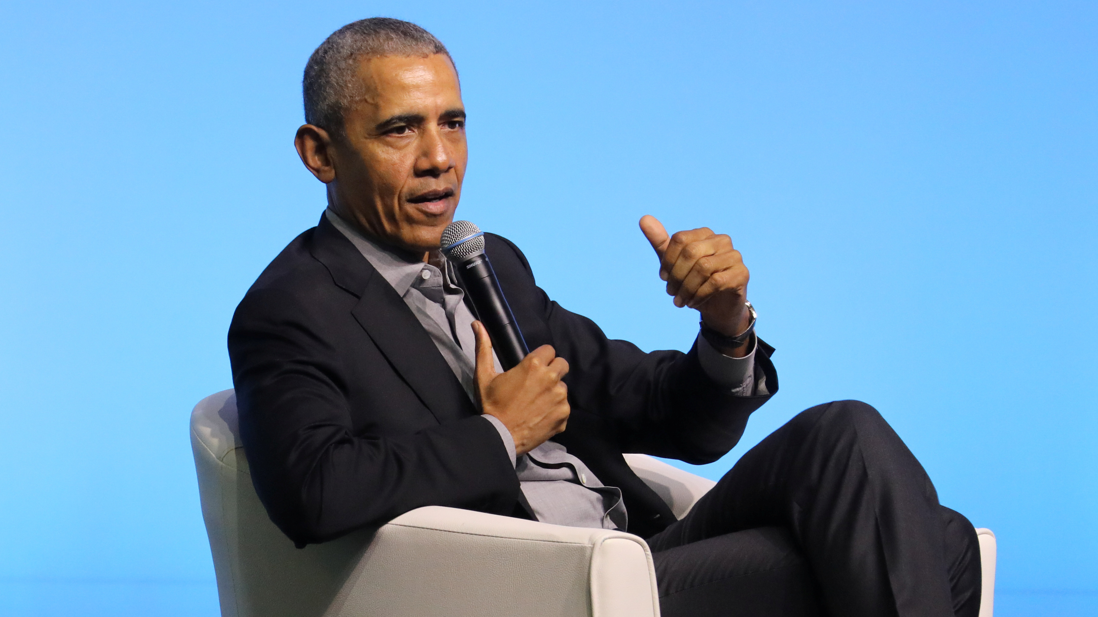 Former President Barack Obama says of men who stay too long in power, "They cling to power. They are insecure. They have outdated ideas."