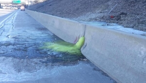 Environmental safety officials in Michigan say they think they have determined the source of a mysterious green slime that seeped onto an interstate on Friday.