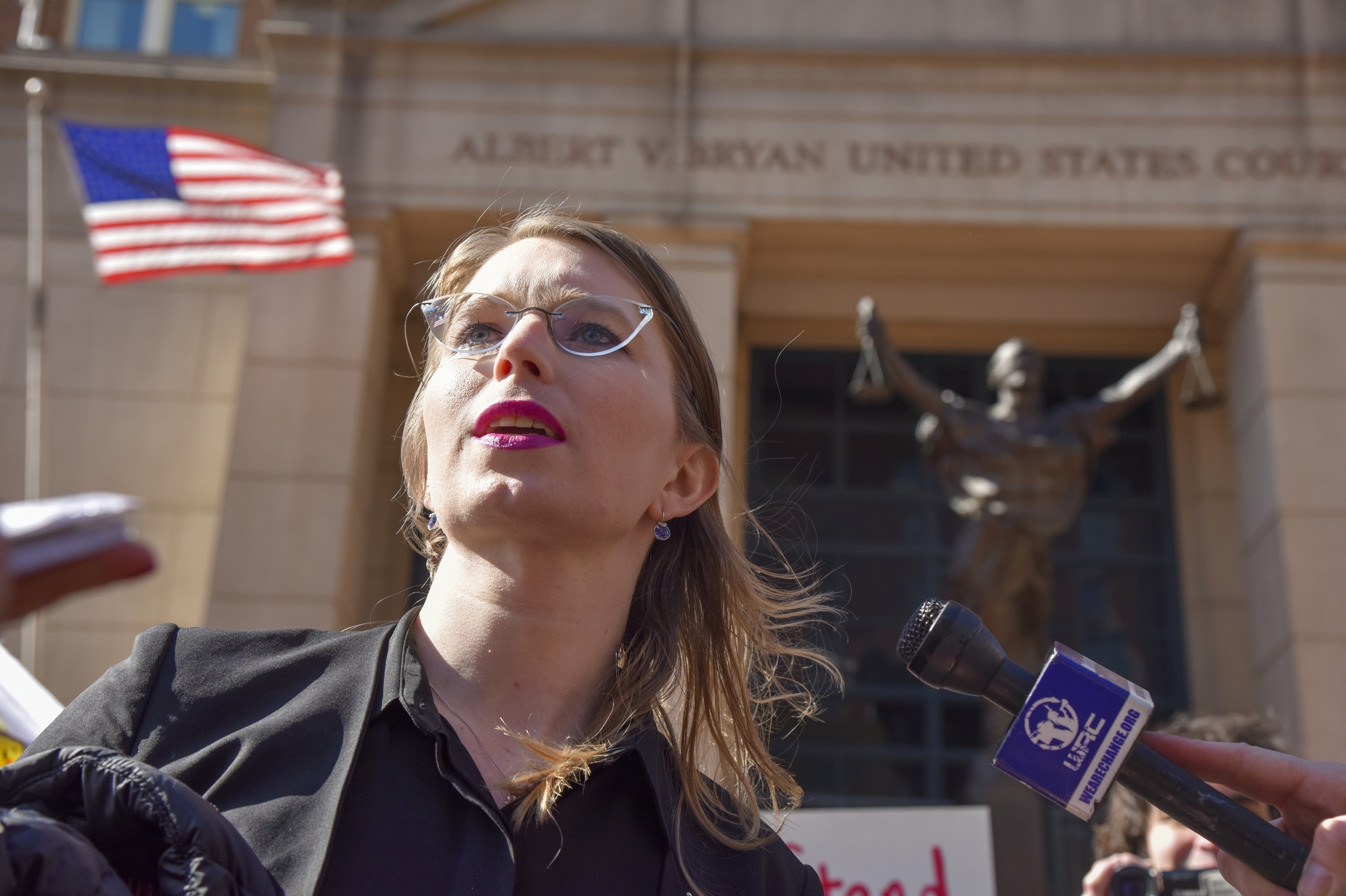 Chelsea Manning leaves the Albert V. Bryan U.S. District Courthouse in northern Virginia in March. A top official with the United Nations says that her punishment for refusing to testify amounts to torture. (The Washington Post via Getty Images)