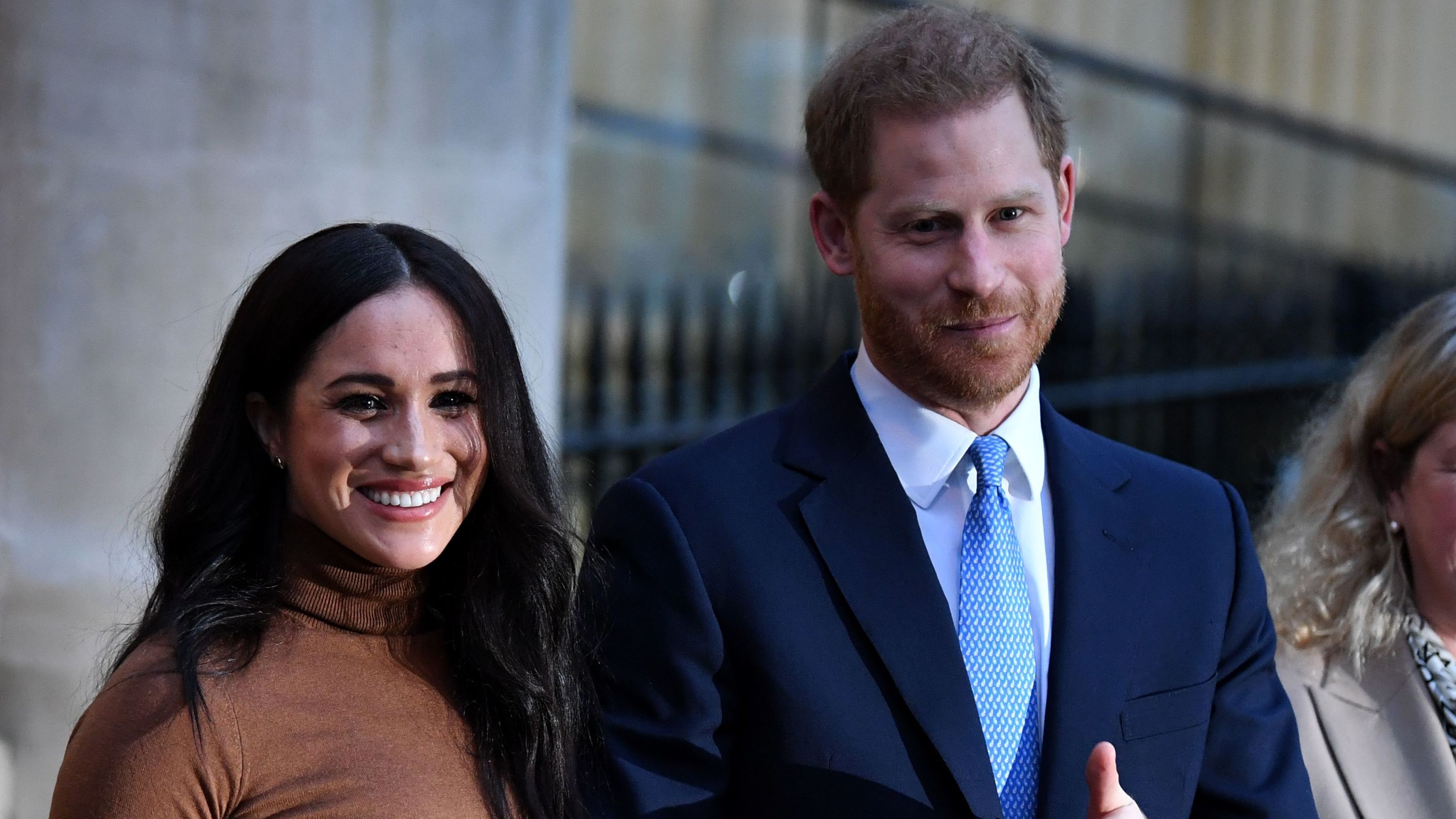 Meghan and Prince Harry as they leave Canada House in London on Tuesday.