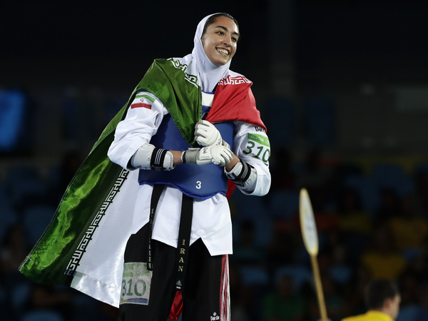 Kimia Alizadeh of Iran celebrates after winning a bronze medal in taekwondo at the 2016 Summer Olympics in Rio de Janeiro, Brazil. She says she is defecting from Iran to escape oppression.