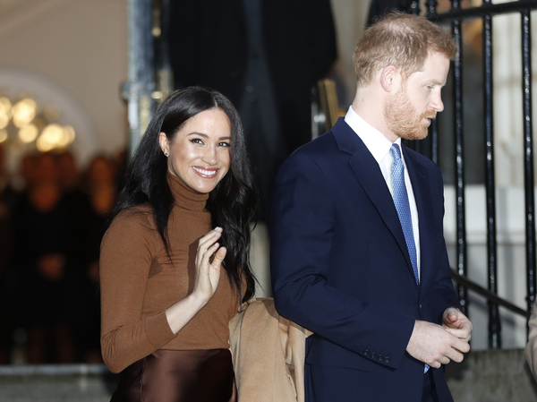 Britain's Prince Harry and Meghan, the Duchess of Sussex, depart from a visit to Canada House in London on Jan. 7.