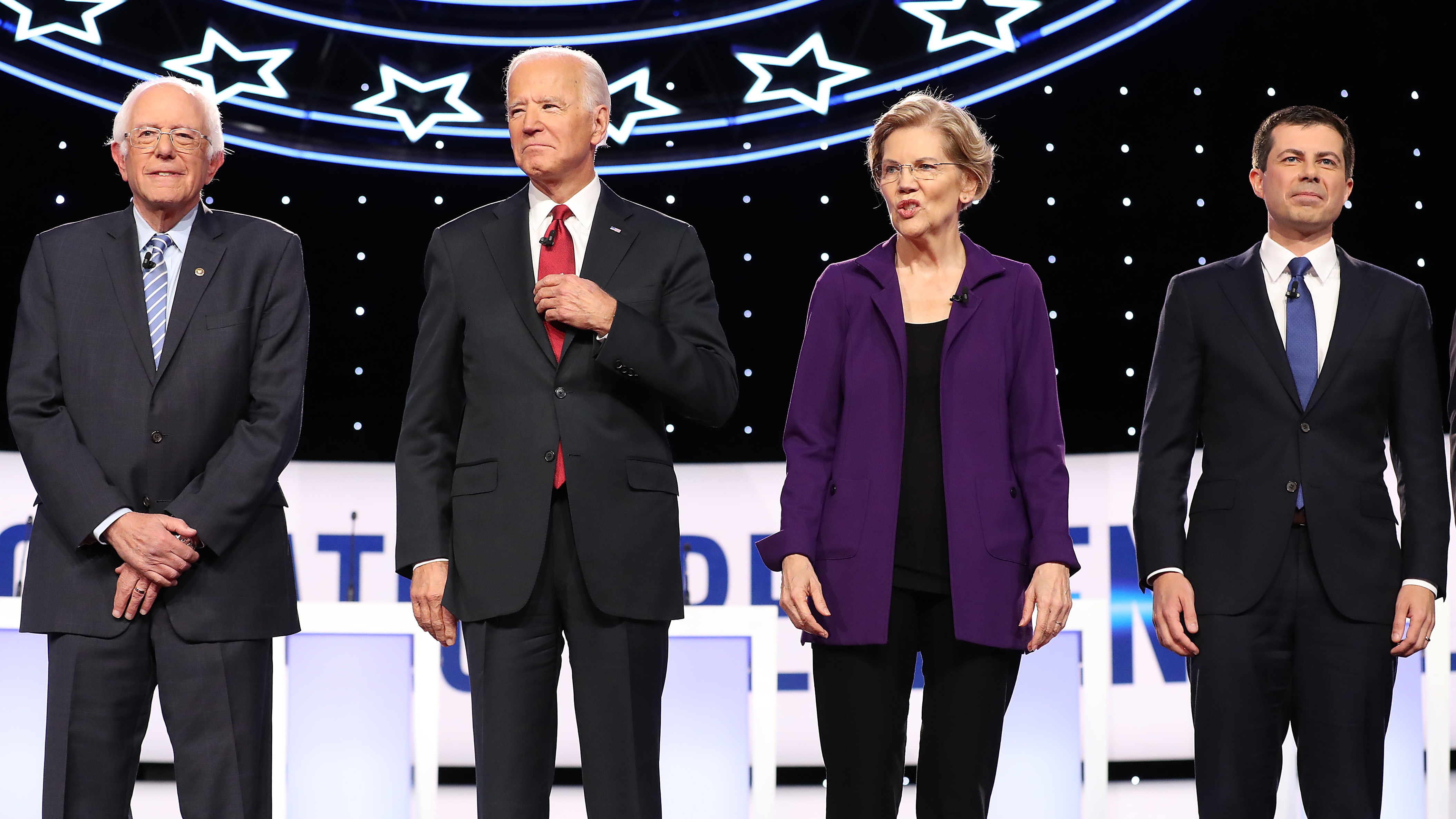 Bernie Sanders, Joe Biden, Elizabeth Warren and Pete Buttigieg appear at the start of the Democratic debate at Otterbein University on Oct. 15 in Ohio. The four enter Tuesday's debate as the top contenders in Iowa. (Getty Images)