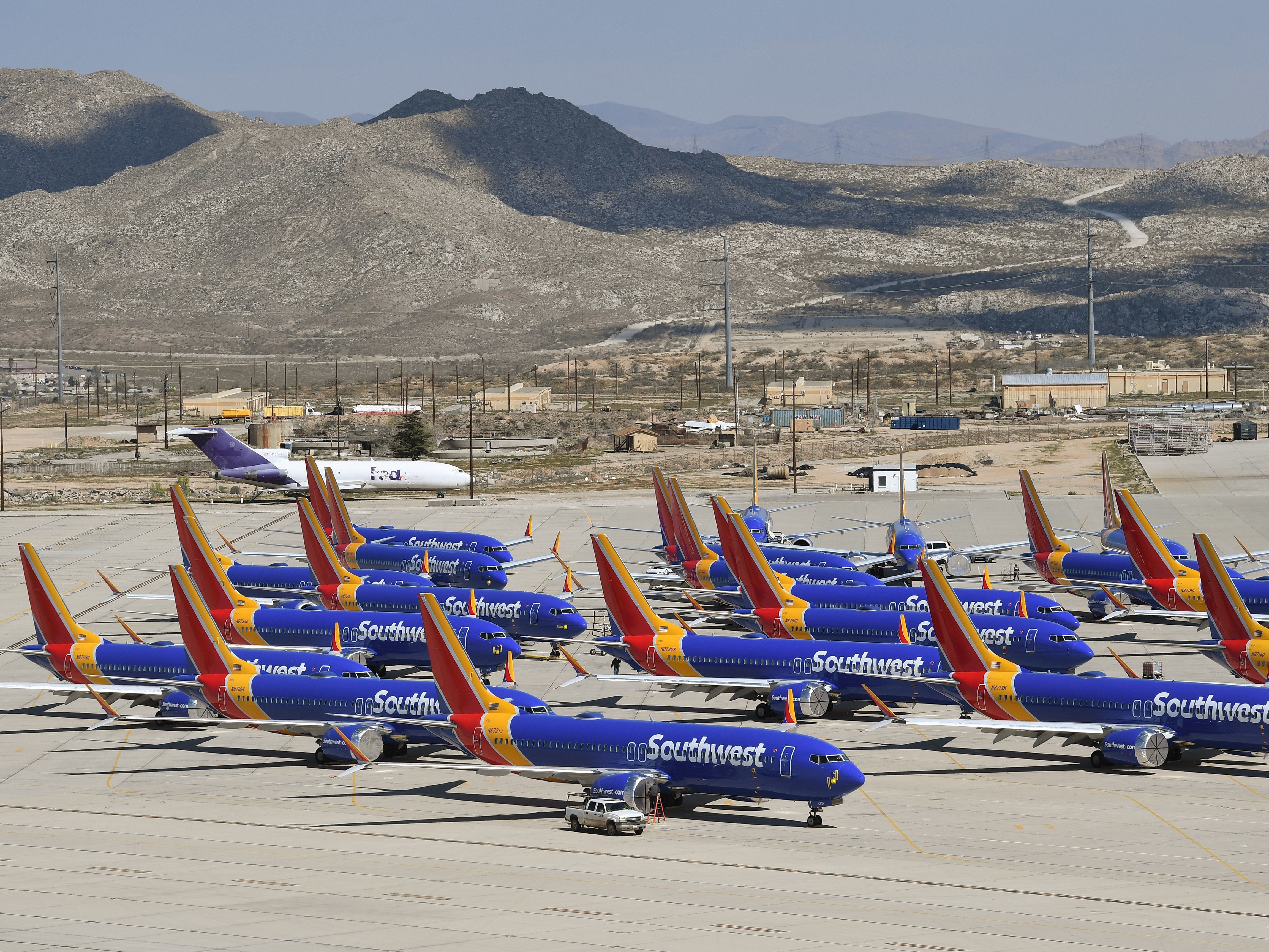 Boeing 737 Max planes are parked on the tarmac after the jets were grounded because of two crashes. (AFP via Getty Images)