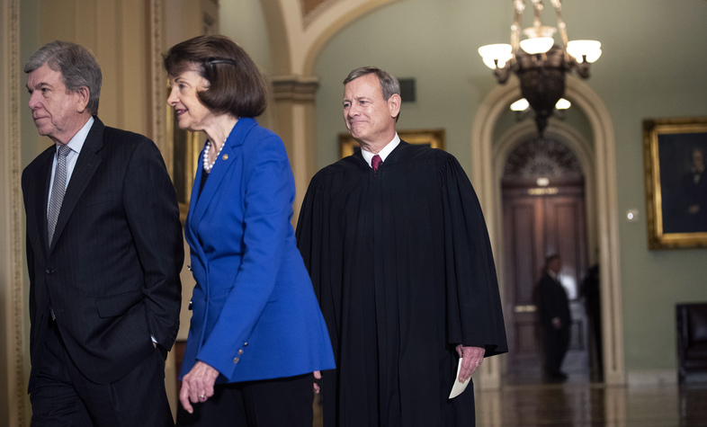 Sen. Roy Blunt, R-Mo. (left); Sen. Dianne Feinstein, D-Calif.; and Supreme Court Chief Justice John Roberts arrive to the Senate chamber for impeachment proceedings on Thursday. (Drew Angerer/Getty Images)