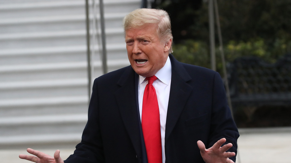 President Trump's legal team offered a fiery brief in his defense on Monday, one day before the Senate impeachment trial is expected to begin. (Mark Wilson/Getty Images)