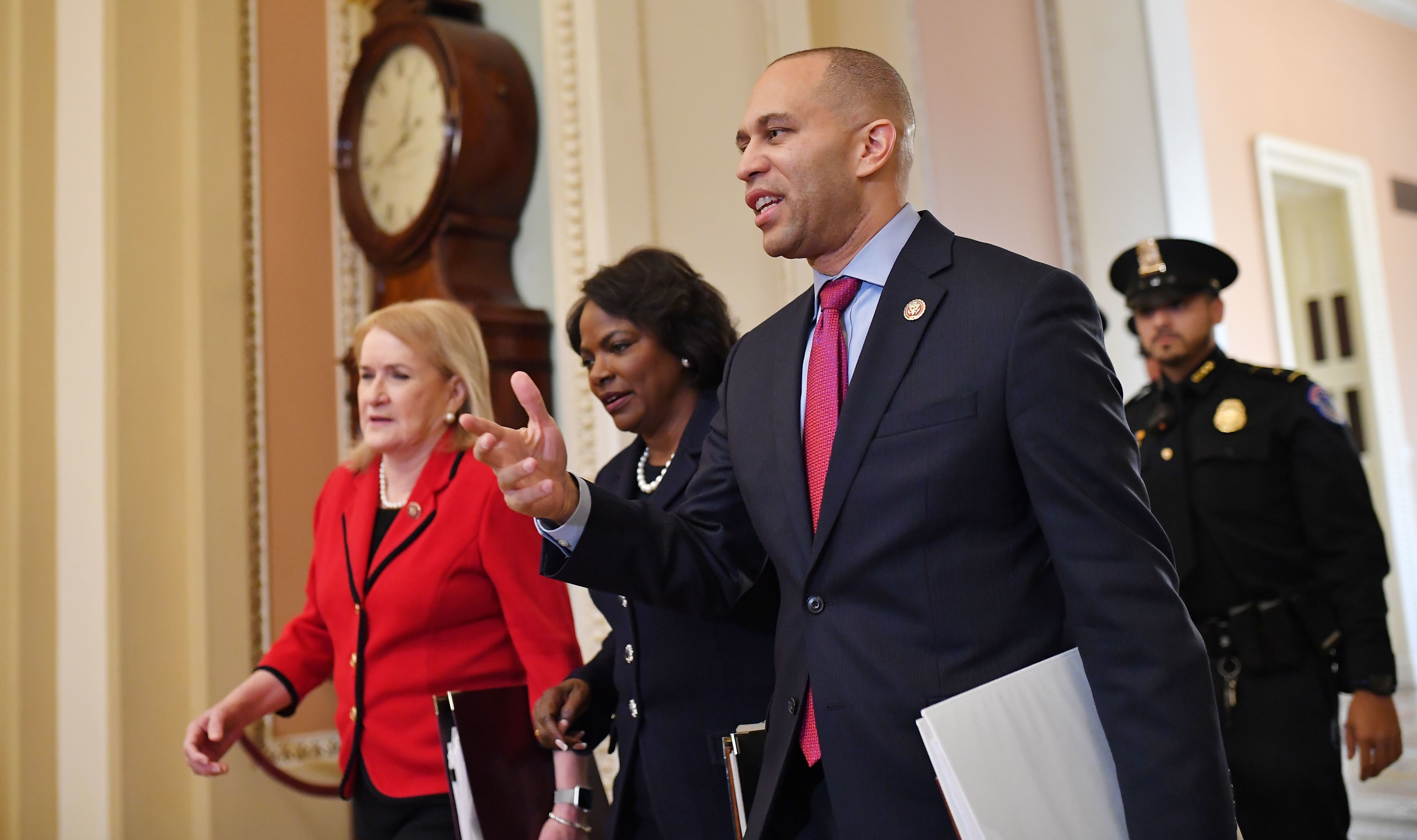 House impeachment managers Sylvia Garcia (from left), Val Demings and Hakeem Jeffries arrive at the Capitol on Thursday. (AFP via Getty Images)
