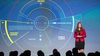 Sandra Joyce, the head of global intelligence at the cybersecurity firm FireEye, speaks at the company's Cyber Defense Summit in 2018. Private tech companies are increasingly taking the lead in reporting information about suspected attacks by foreign actors. In some cases, the companies sell their reports to the U.S. intelligence community.