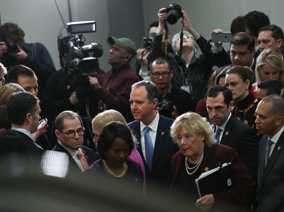 House Manager Adam Schiff (center) leaves after speaking to reporters during the Senate impeachment trial of President Trump Friday. (Andrew Caballero-Reynolds/AFP via Getty Images)