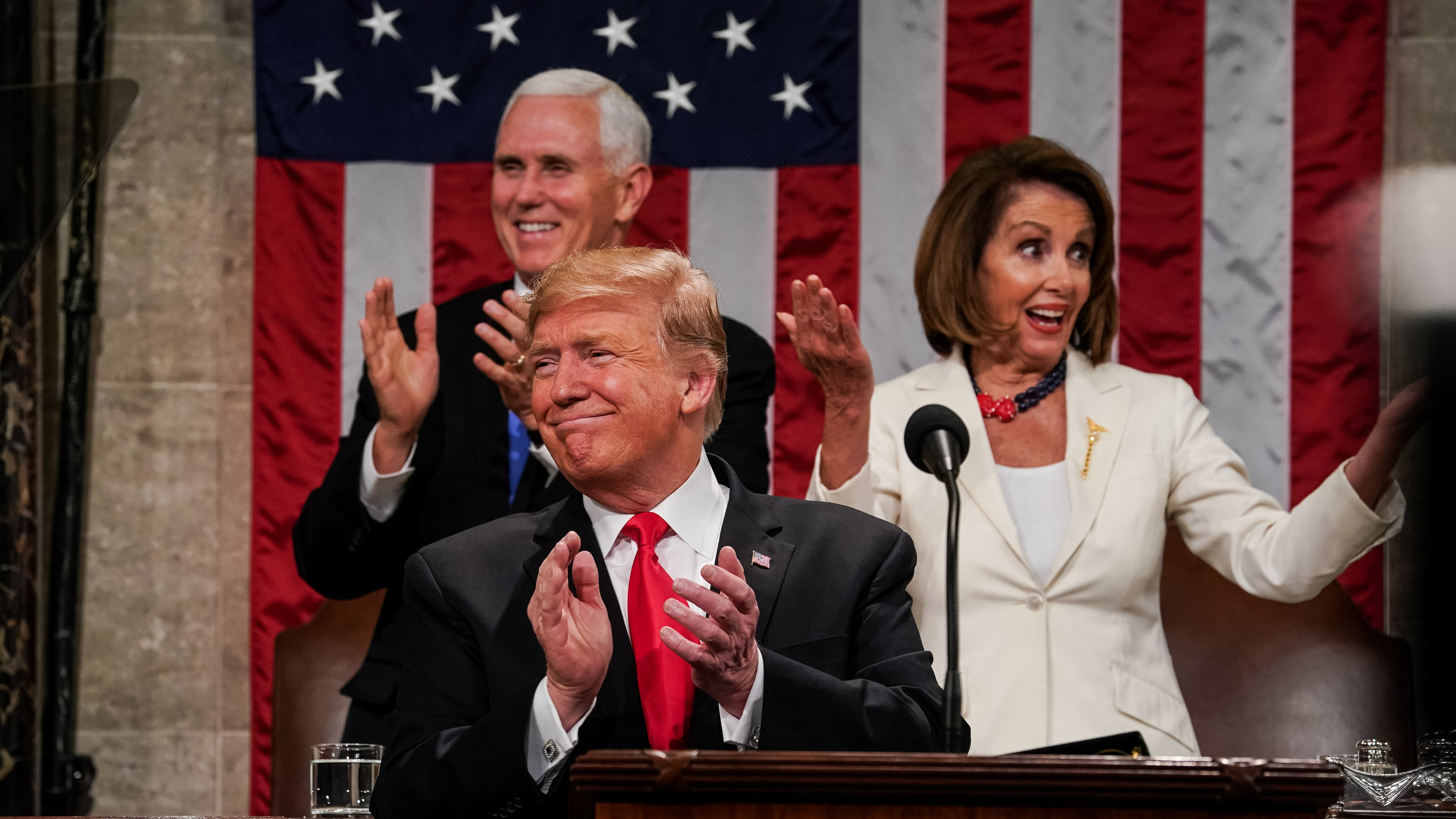 President Trump, Speaker Nancy Pelosi and Vice President Pence applaud during the State of the Union address on Feb. 5, 2019. (Getty Images)
