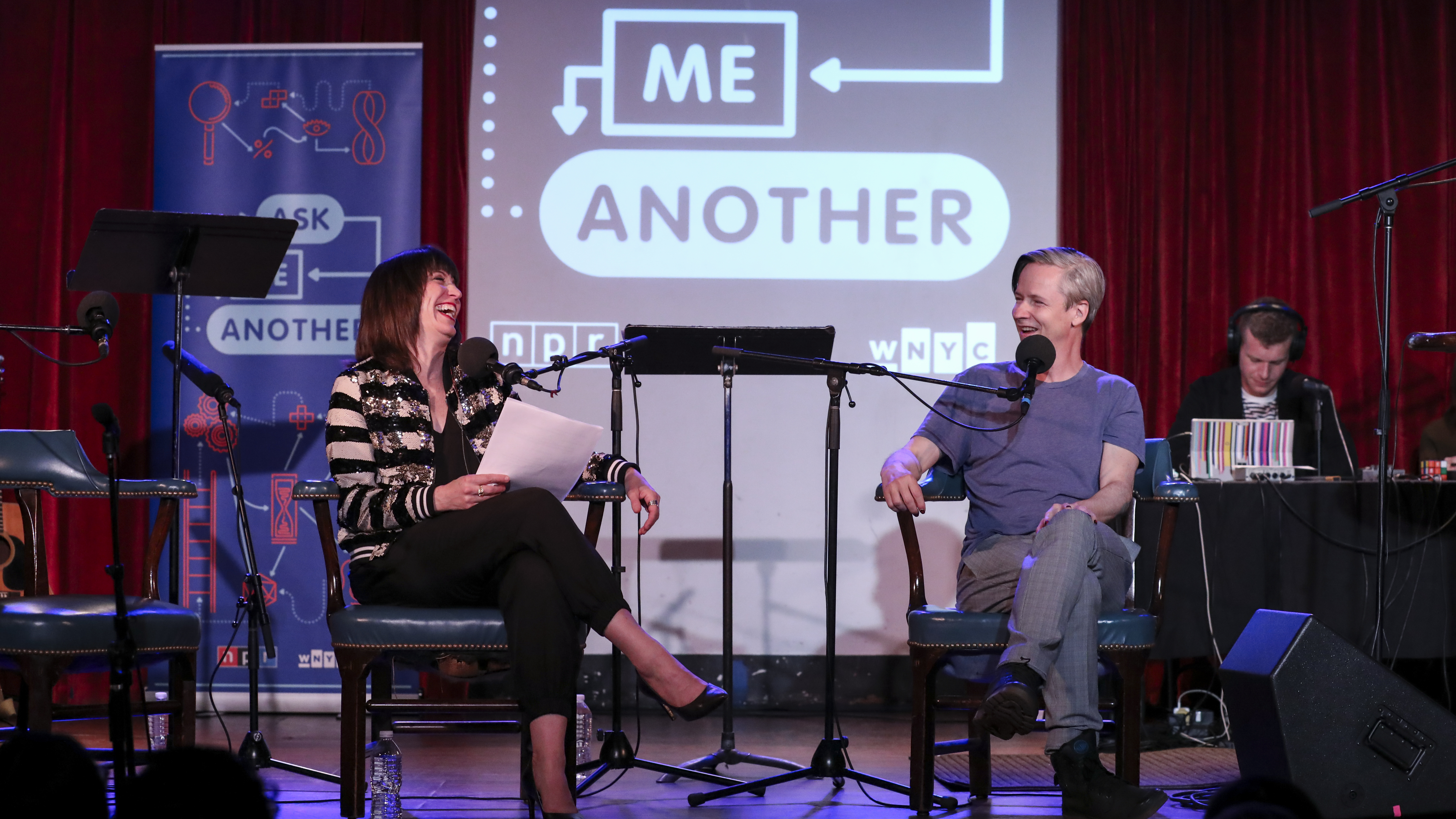 Ask Me Another host Ophira Eisenberg interviews John Cameron Mitchell at the Bell House in Brooklyn, New York.