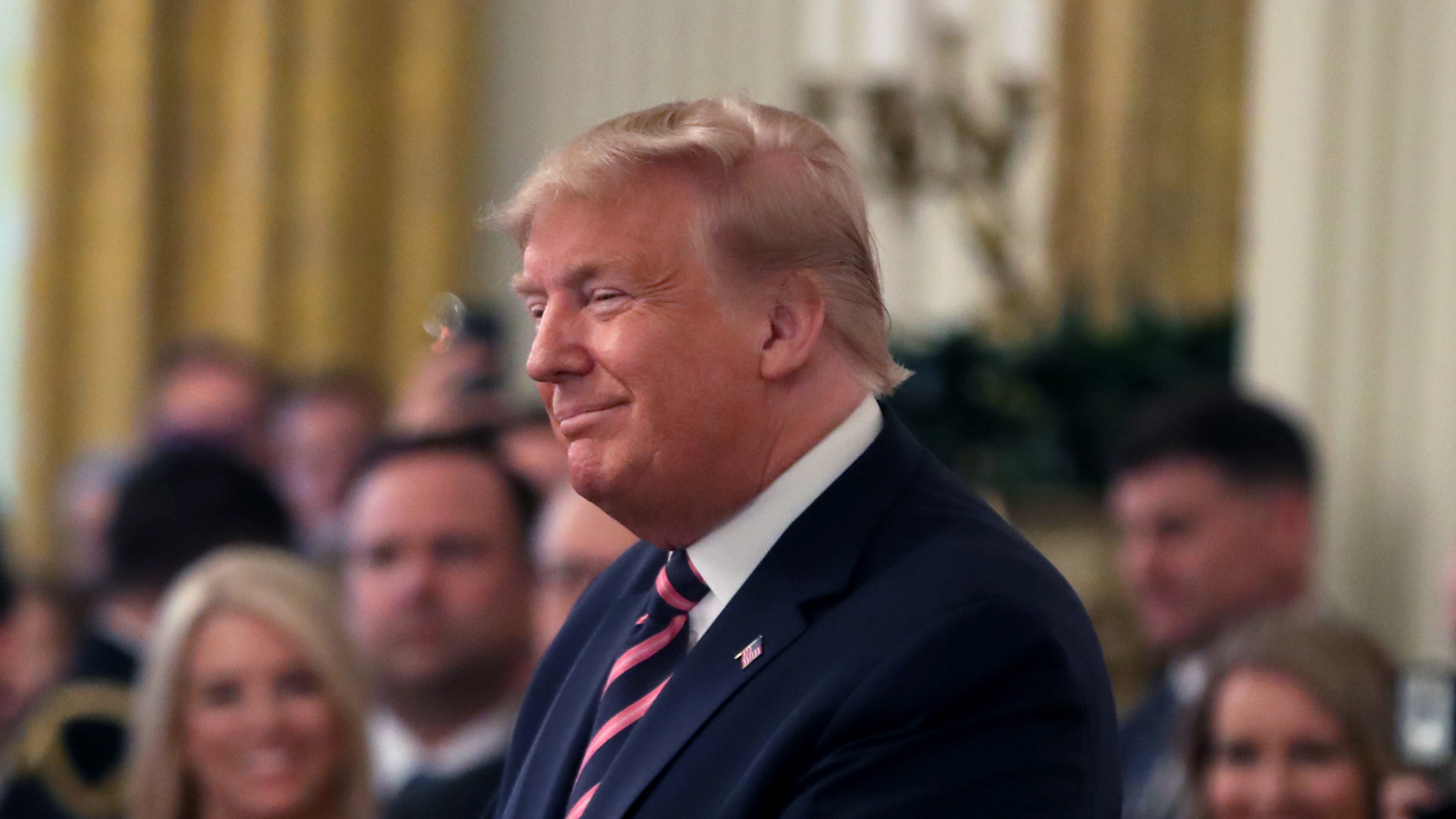 President Trump arrives to speak to the media, one day after the U.S. Senate acquitted on two articles of impeachment, on Thursday. (Getty Images)