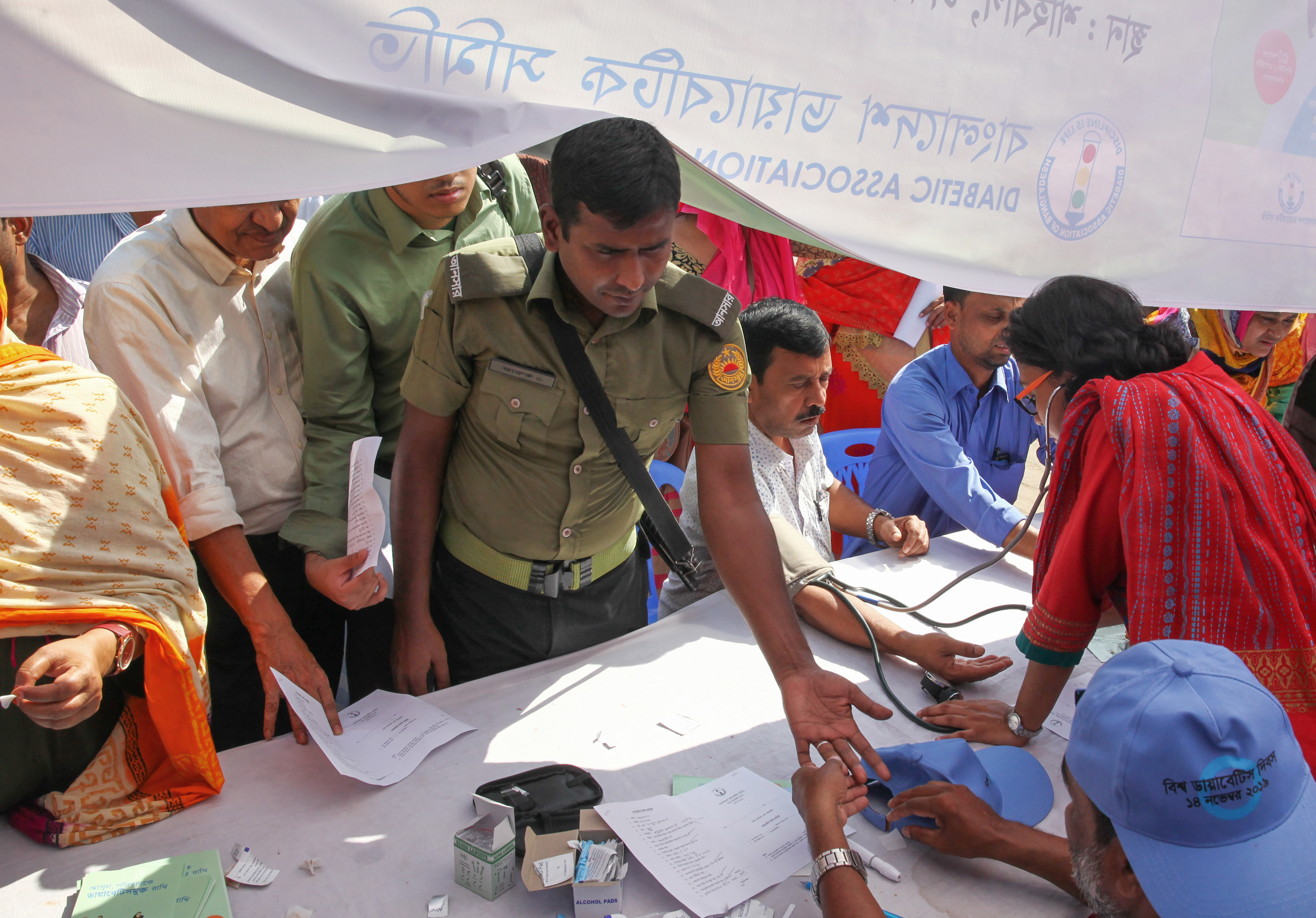 A man gets tested for diabetes at an event in Dhaka, Bangladesh, for World Diabetes Day in 2019. (NurPhoto via Getty Images)
