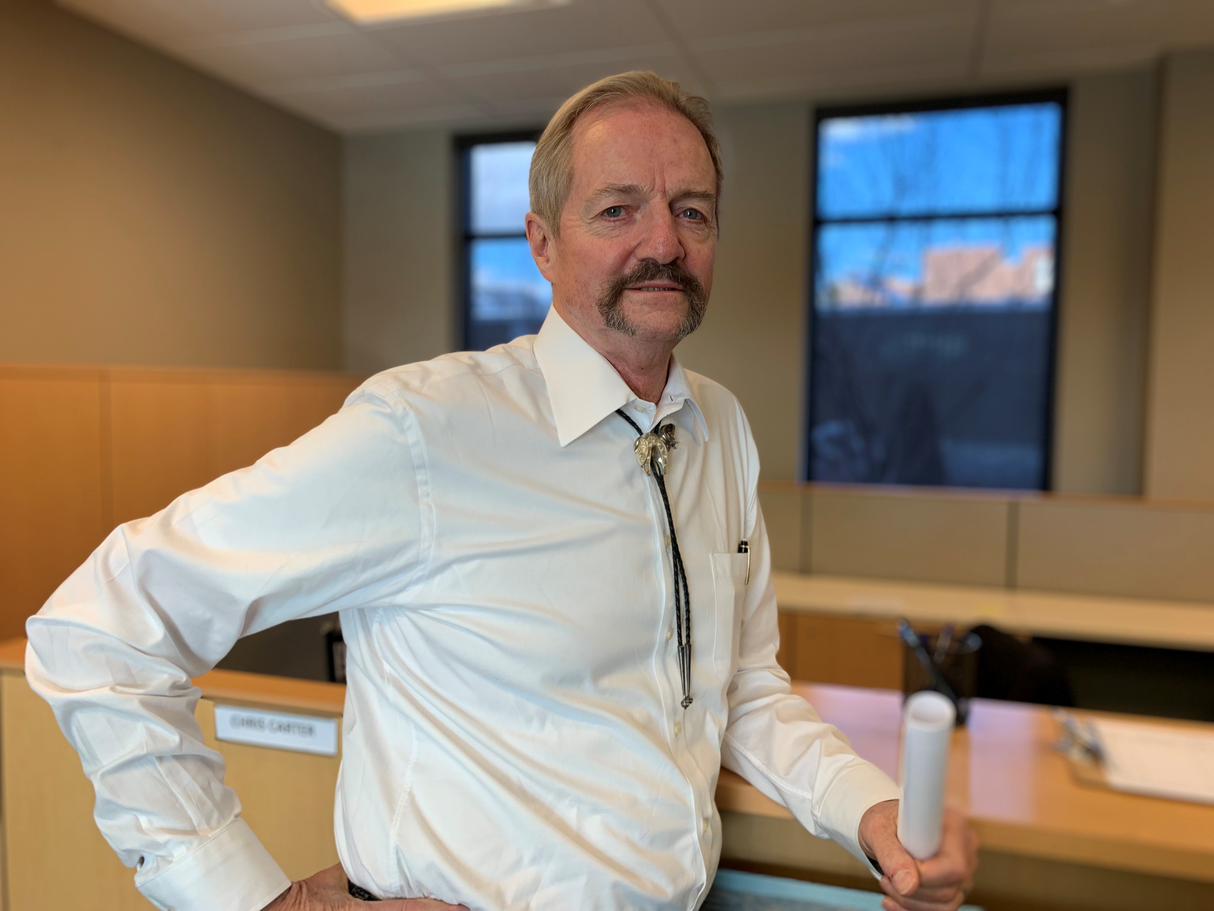Acting BLM Director William Perry Pendley stands in the mostly empty suite of offices at the agency's new planned headquarters in Grand Junction, Colo. (NPR)