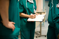 Coronavirus has yet to sicken American health workers, as it has in China. But deaths of hospital workers in Asia have heightened scrutiny of the U.S. health care system's ability to protect people on the front line.