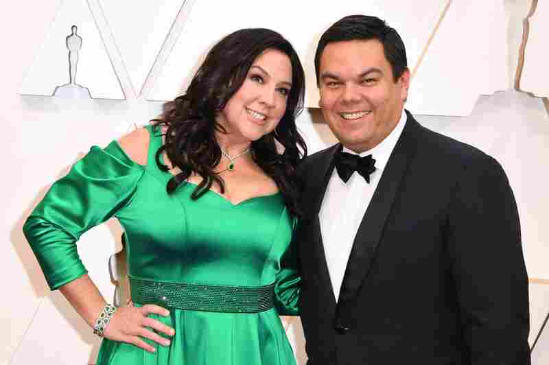 US songwriter Kristen Anderson-Lopez (L) and US songwriter Robert Lopez arrive for the 92nd Oscars at the Dolby Theatre in Hollywood, California on February 9, 2020. (Photo by Robyn Beck / AFP) (Photo by ROBYN BECK/AFP via Getty Images)