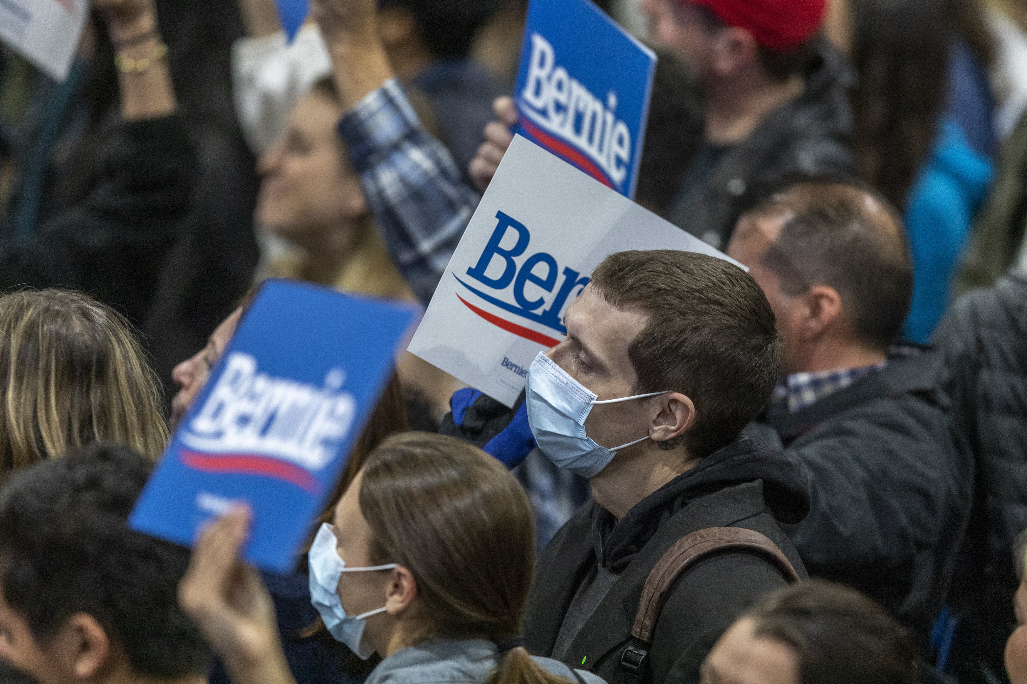 Supporters wear medical masks, as fears of coronavirus increase in California, during a campaign rally for Presidential candidate Sen. Bernie Sanders in Los Angeles on March 1, 2020. (Getty Images)
