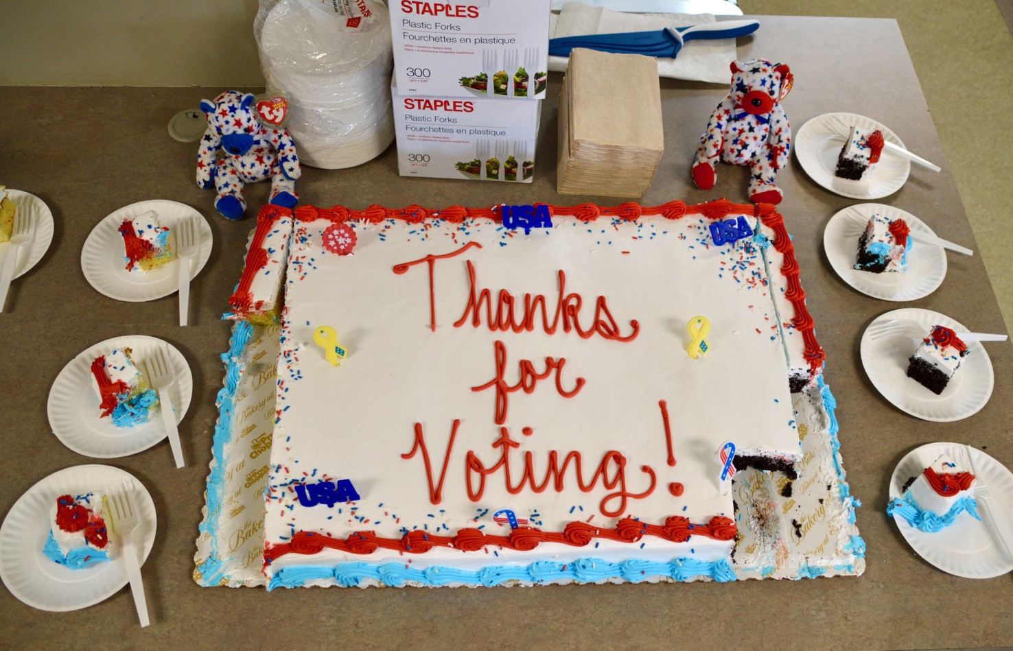 In Mendon, Vt., the first voter arrived 10 minutes before polls opened at 8 a.m. &quot;She was so excited,&quot; said Town Clerk Nancy Gondella, &quot;since she realized she'd get the first piece of cake.&quot; (Nina Keck/VPR)