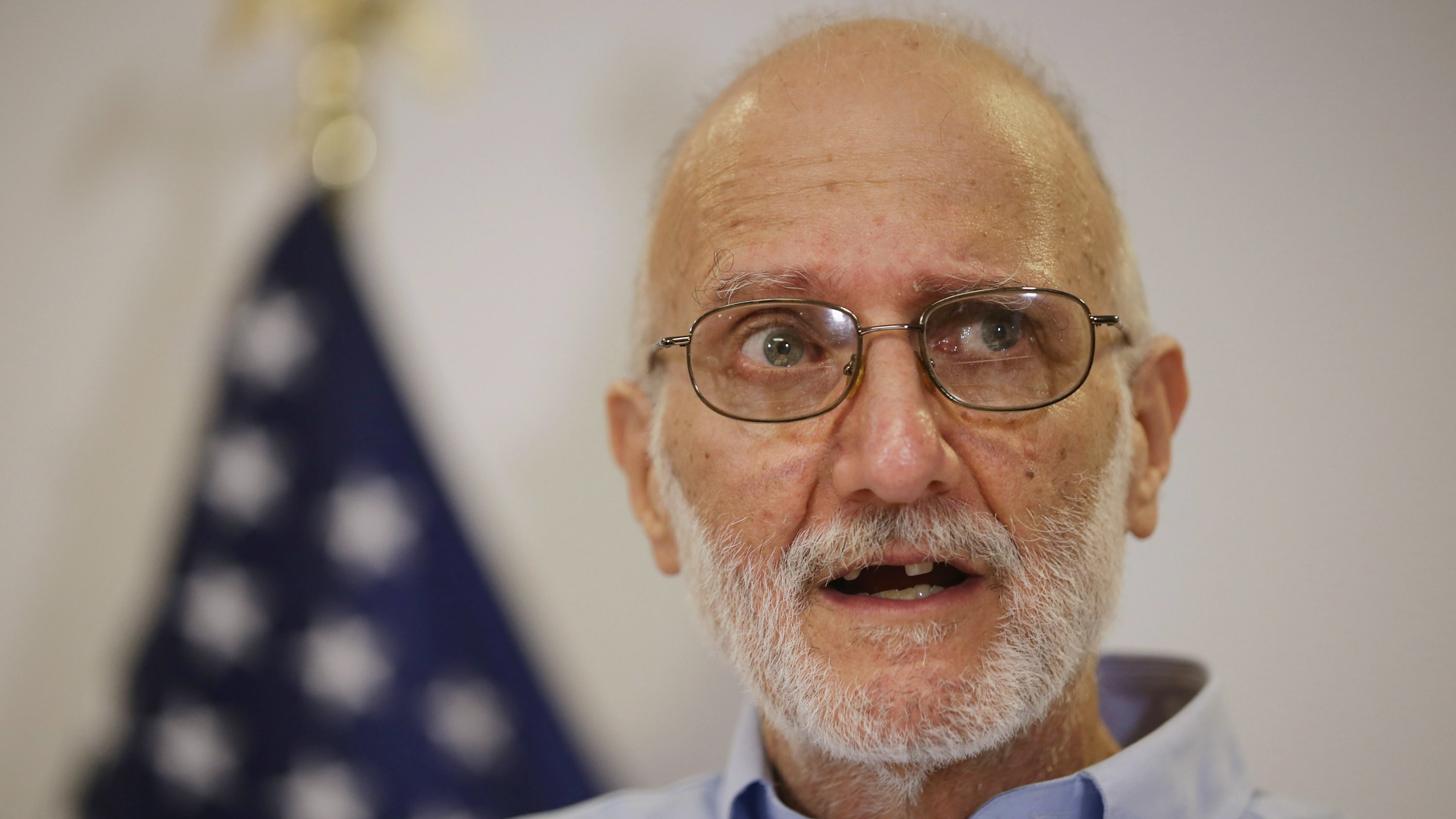 Alan Gross makes a statement  after arriving back in the United States on Dec. 17, 2014. A U.S. Agency for International Development subcontractor, Gross was imprisoned in Cuba for five years on espionage charges. He told NPR that Sen. Bernie Sanders visited him in detention and remarked that he didn't understand why others criticized Cuba.